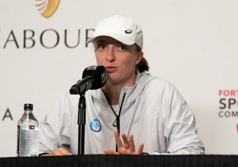 Iga Swiatek (POL) speaks during a press conference after defeating Coco Gauff (USA) on day six of the WTA Finals at Dickies Arena.
