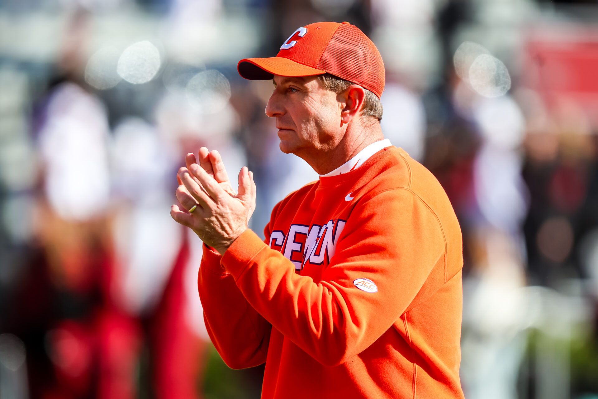 Clemson Tigers head coach Dabo Swinney applauds during warmups before their game against the South Carolina Gamecocks at Williams-Brice Stadium.