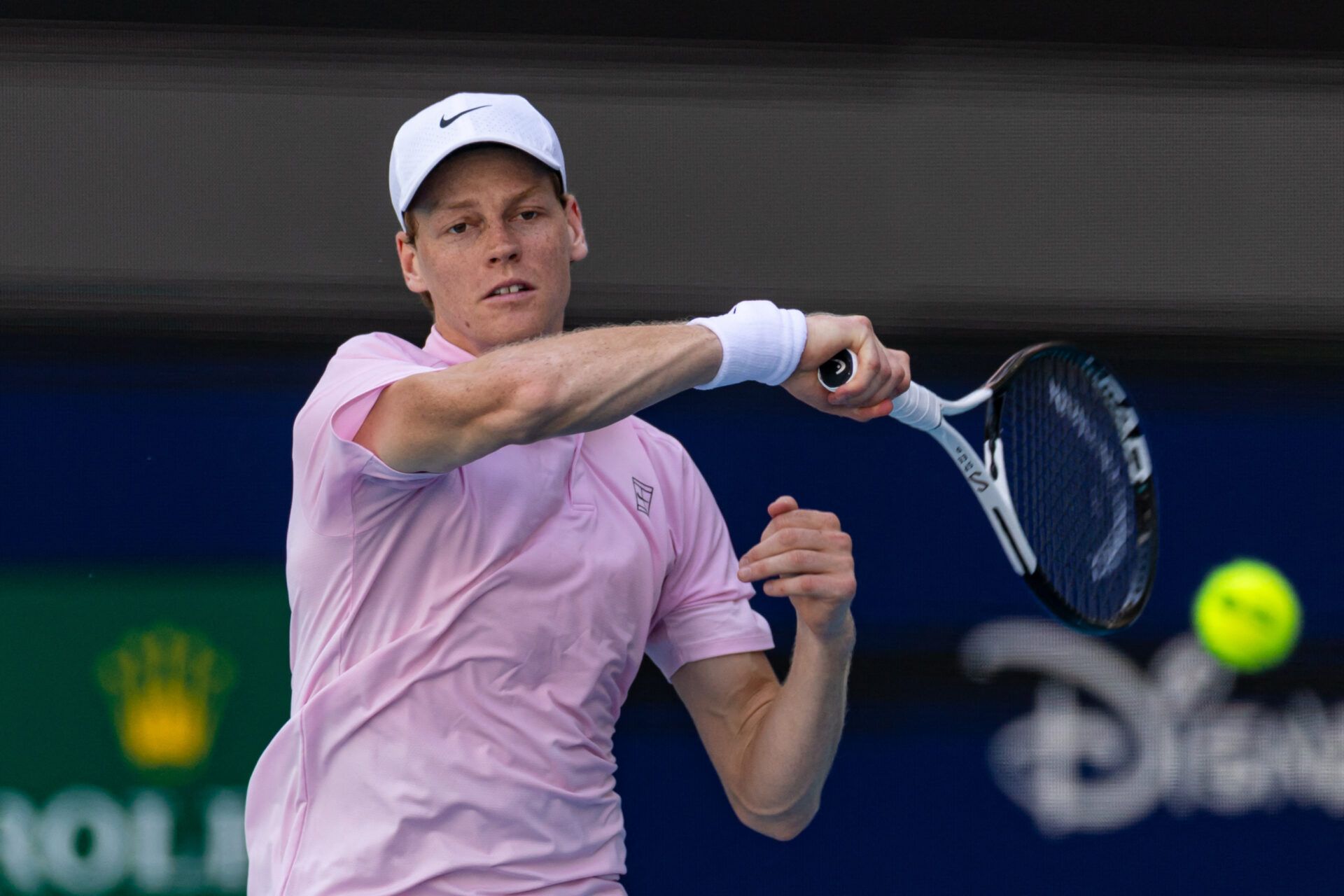 Jannik Sinner of Italy returns a point during a match against Frances Tiafoe of the United States in the quarter finals of the menÕs singles at the Miami Open at Hard Rock Stadium.
