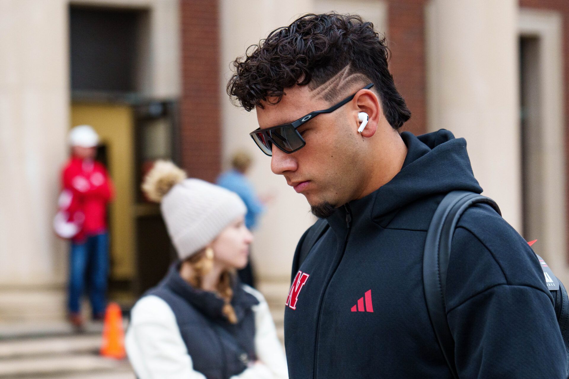 Nebraska Cornhuskers quarterback Dylan Raiola (15) arrives before the game against the Northwestern Wildcats at Memorial Stadium.