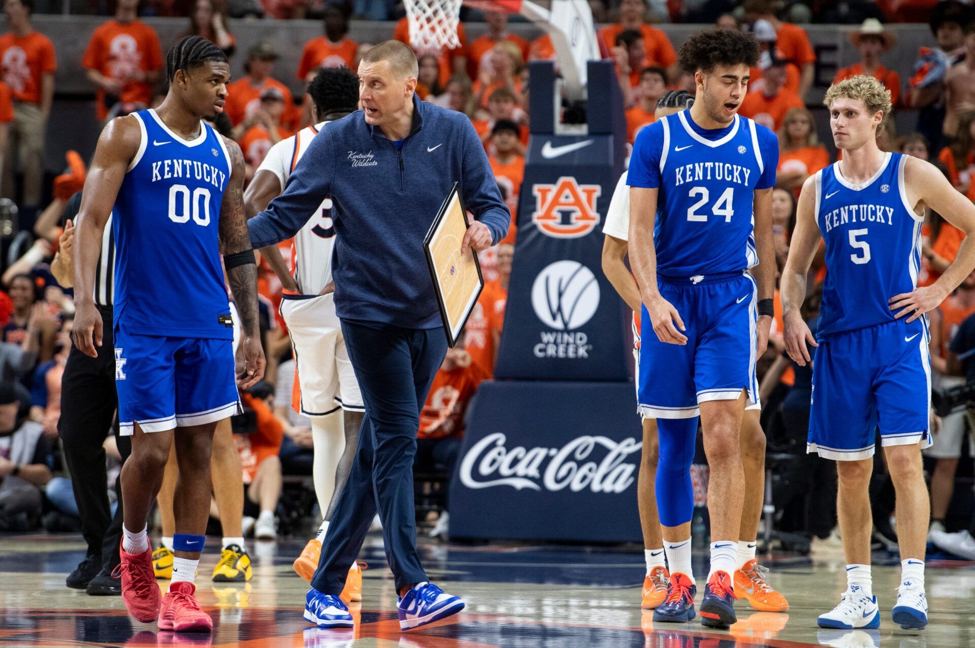Kentucky Wildcats head coach Mark Pope talks with his team as Auburn Tigers take on Kentucky Wildcats at Neville Arena in Auburn, Ala. on Saturday, Feb. 21, 2026. Auburn Tigers defeated Kentucky Wildcats 75-74.