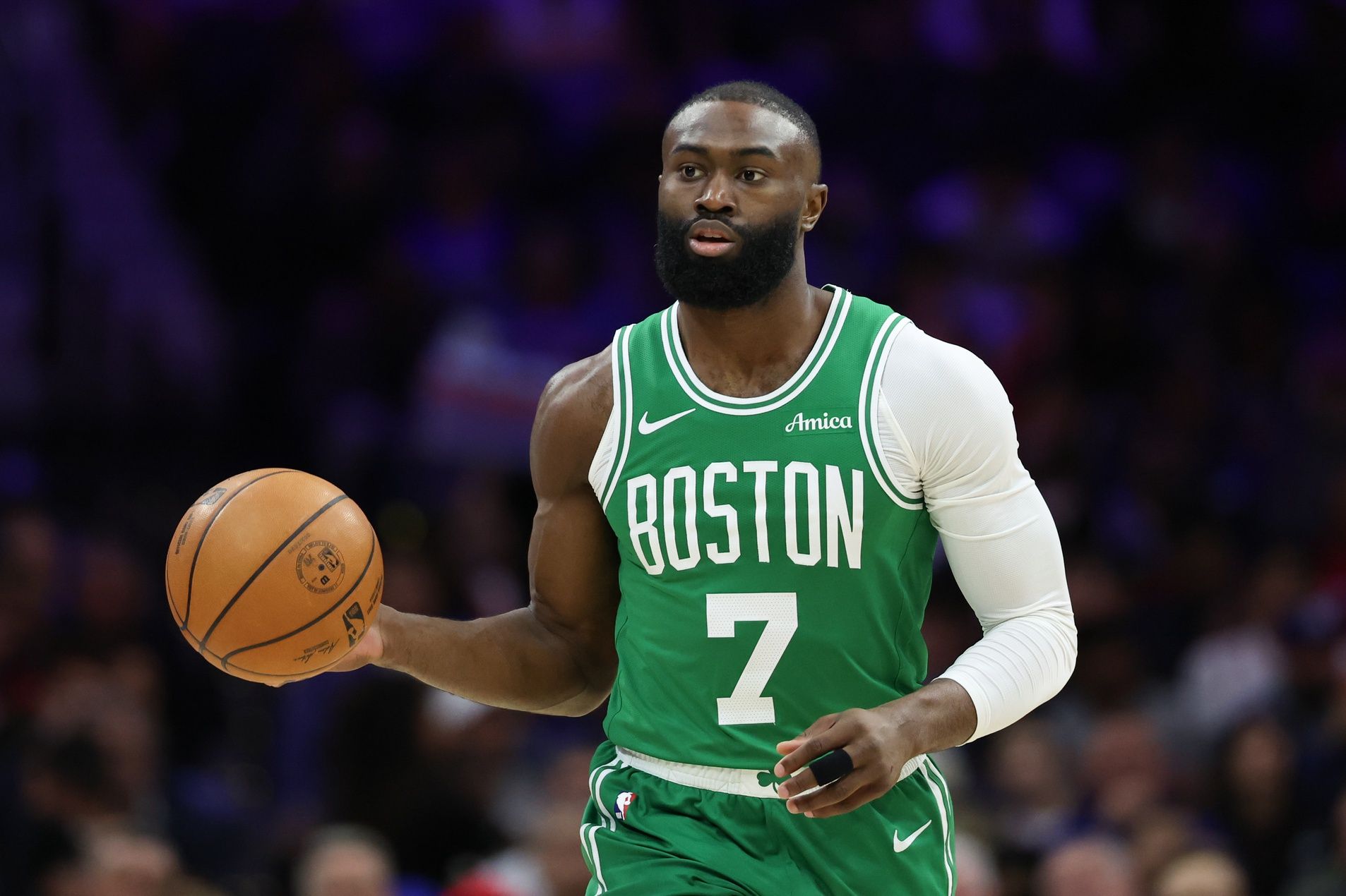 Boston Celtics guard Jaylen Brown (7) dribbles the ball against the Philadelphia 76ers during the first quarter at Xfinity Mobile Arena.