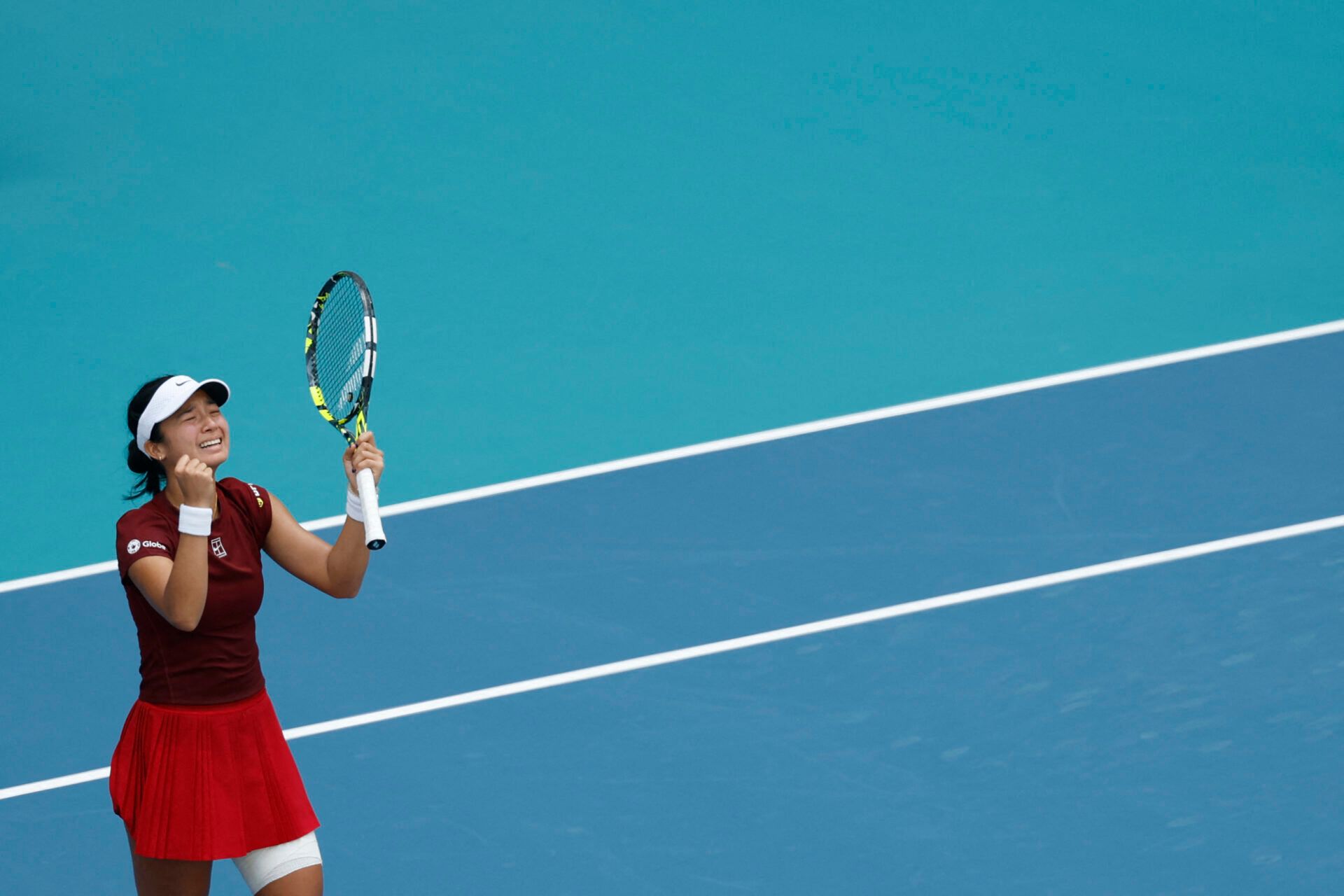 Alexandra Eala (PHL) celebrates after her match against Iga Swiatek (POL)(not pictured) on day nine of the Miami Open at Hard Rock Stadium.