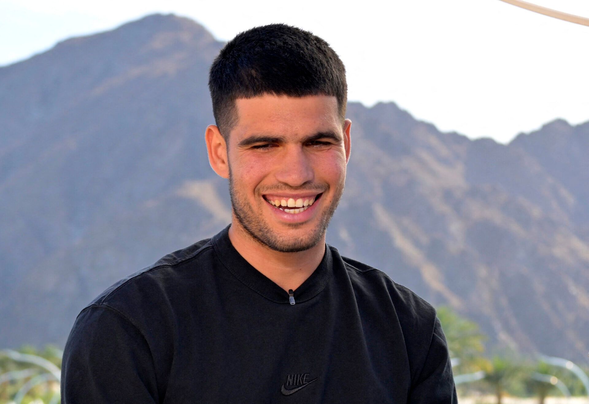 Carlos Alcaraz (ESP) is interviewed by media during the BNP Paribas Open at the Indian Well Tennis Garden.
