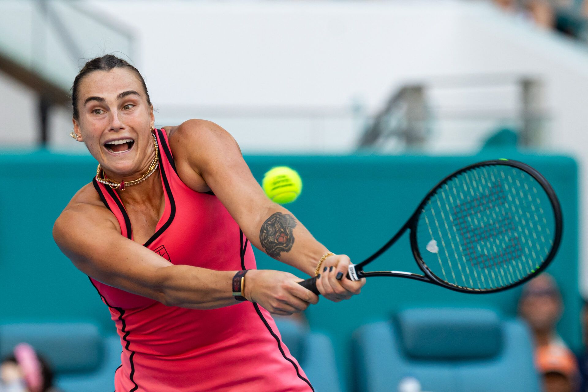Aryna Sabalenka of Belarus hits a backhand against Coco Gauff of the United States in the final of the women’s singles at the Hard Rock Stadium.