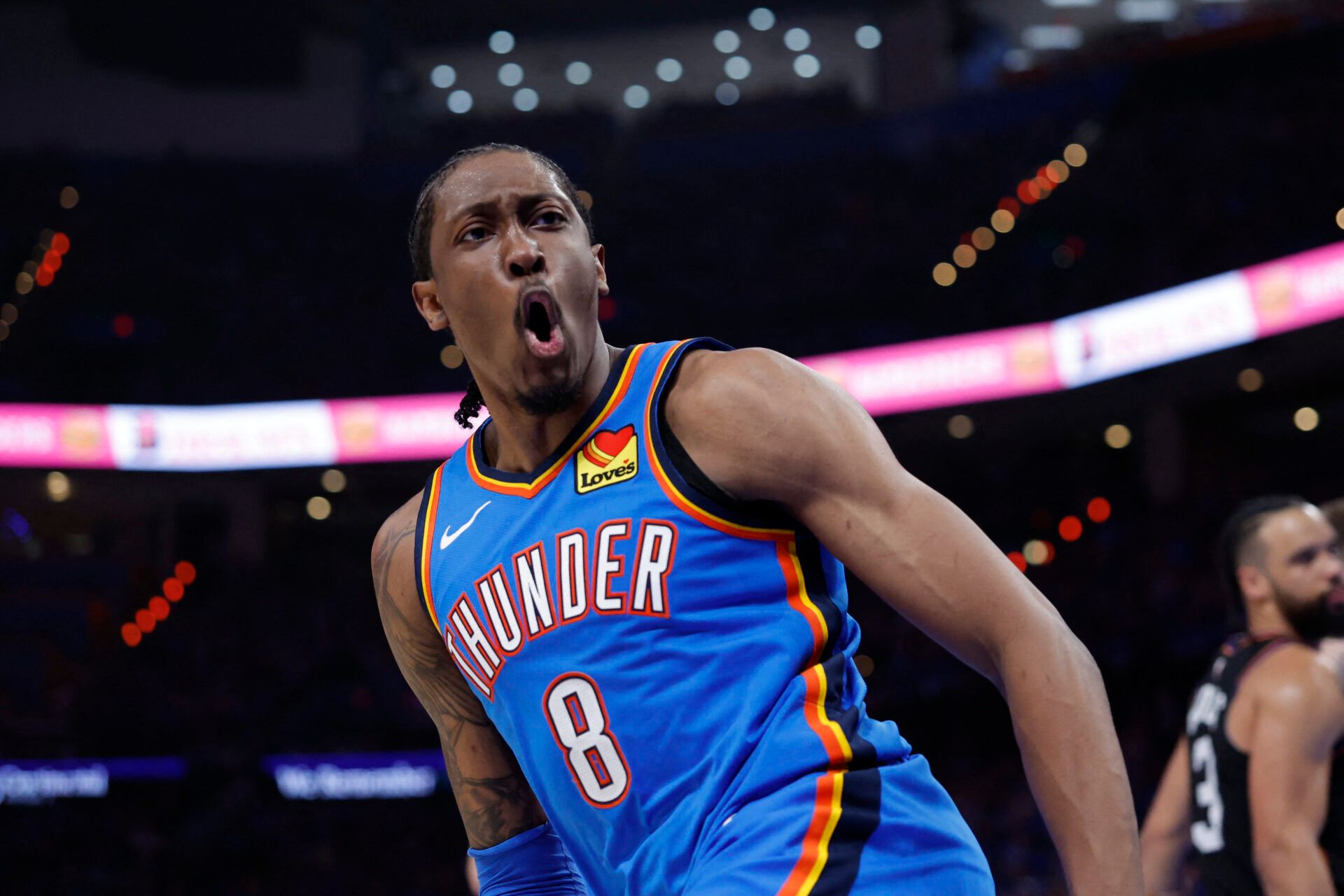 Oklahoma City Thunder guard Jalen Williams (8) celebrates after scoring against the Phoenix Suns in the second half during game one of the first round of the 2026 NBA Playoffs at Paycom Center.