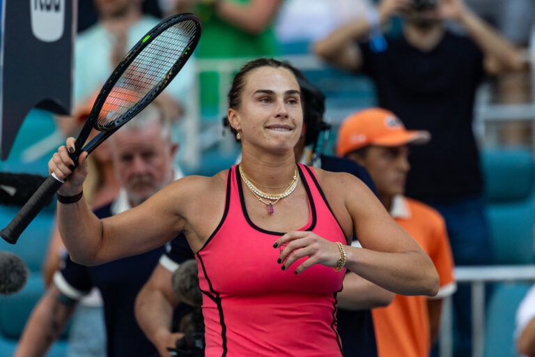 Aryna Sabalenka of Belarus celebrates beating Coco Gauff of the United States in the final of the women’s singles at the Hard Rock Stadium.