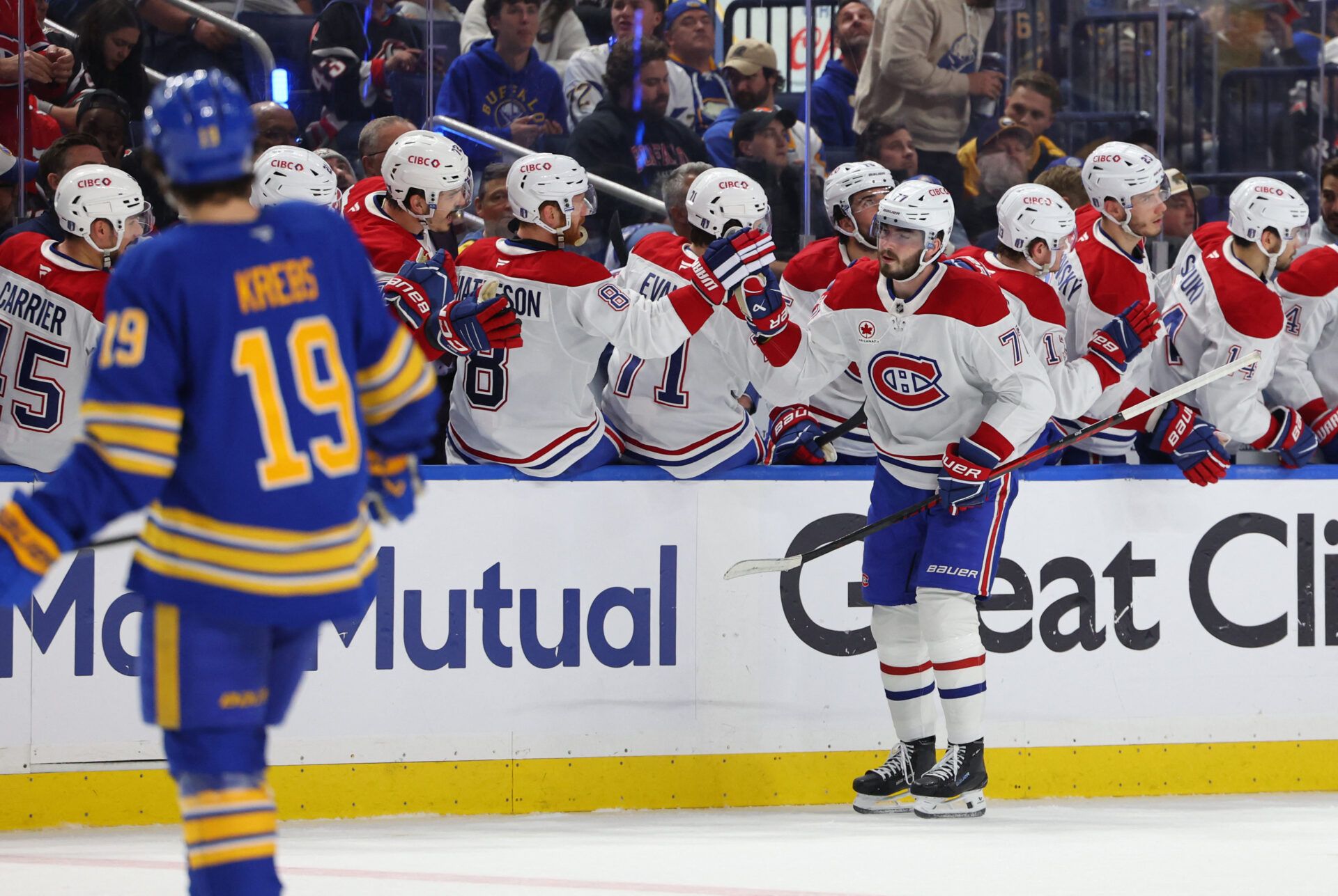 Montréal Canadiens center Kirby Dach (77) celebrates his goal with teammates during the second period against the Buffalo Sabres in game one of the second round of the 2026 Stanley Cup Playoffs at KeyBank Center.