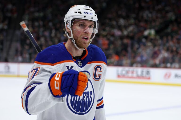 Edmonton Oilers center Connor McDavid (97) celebrates his goal against the Minnesota Wild during the first period at Grand Casino Arena.