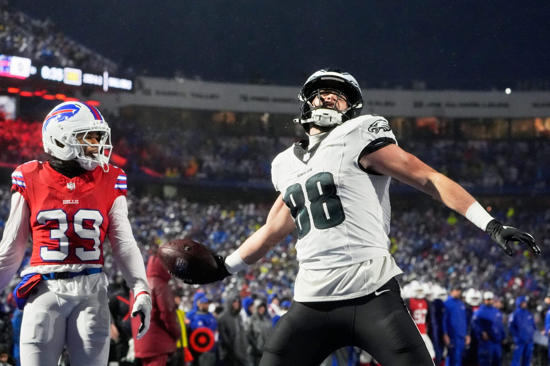 Philadelphia Eagles tight end Dallas Goedert (88) reacts after catching a one-yard touchdown thrown by quarterback Jalen Hurts (not pictured) against Buffalo Bills cornerback Cam Lewis (39) during the first quarter at Highmark Stadium.