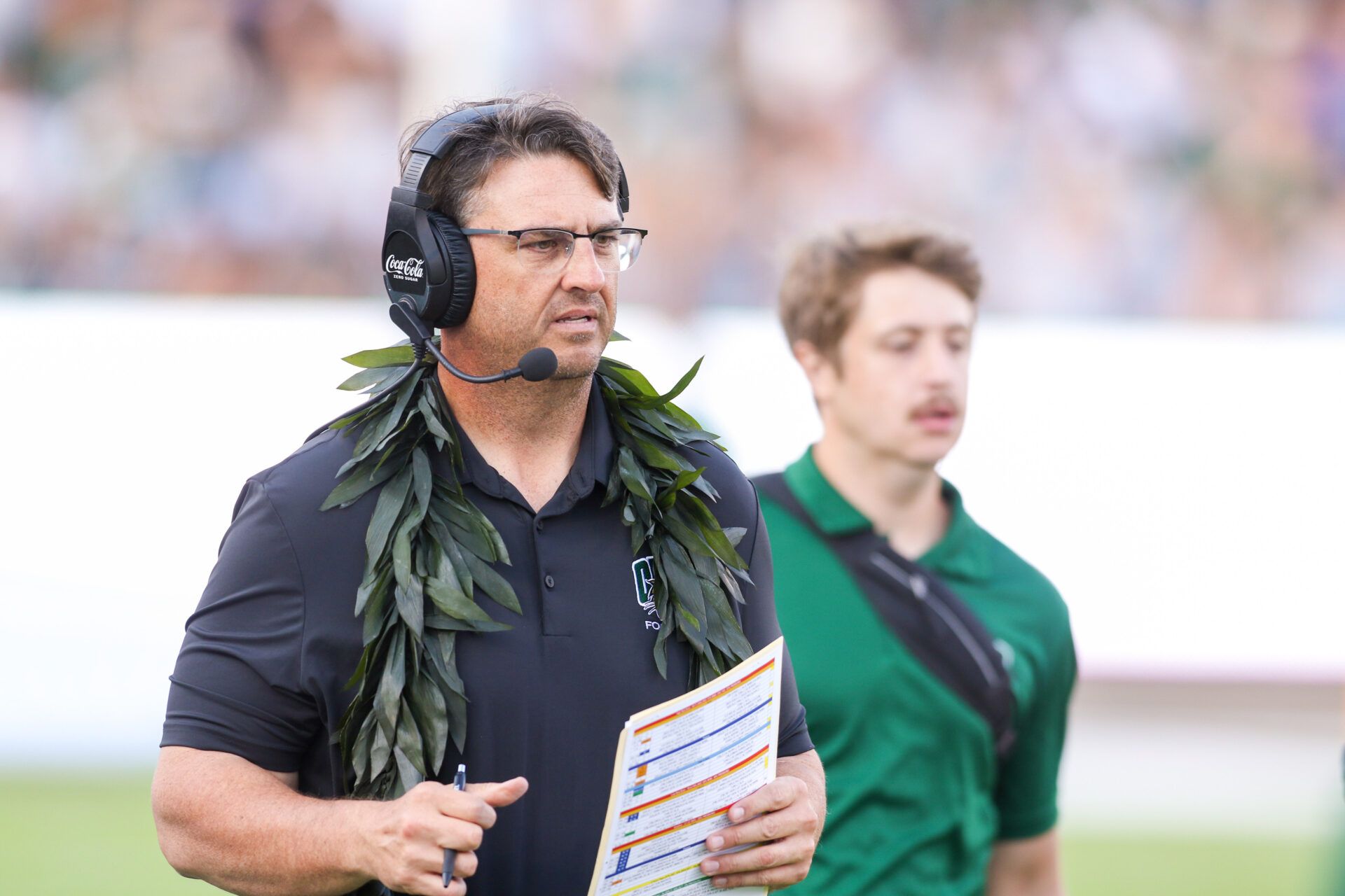 Ohio Bobcats head coach Brian Smith walks along the sidelines during the fourth quarter against the West Virginia Mountaineers at Peden Stadium.