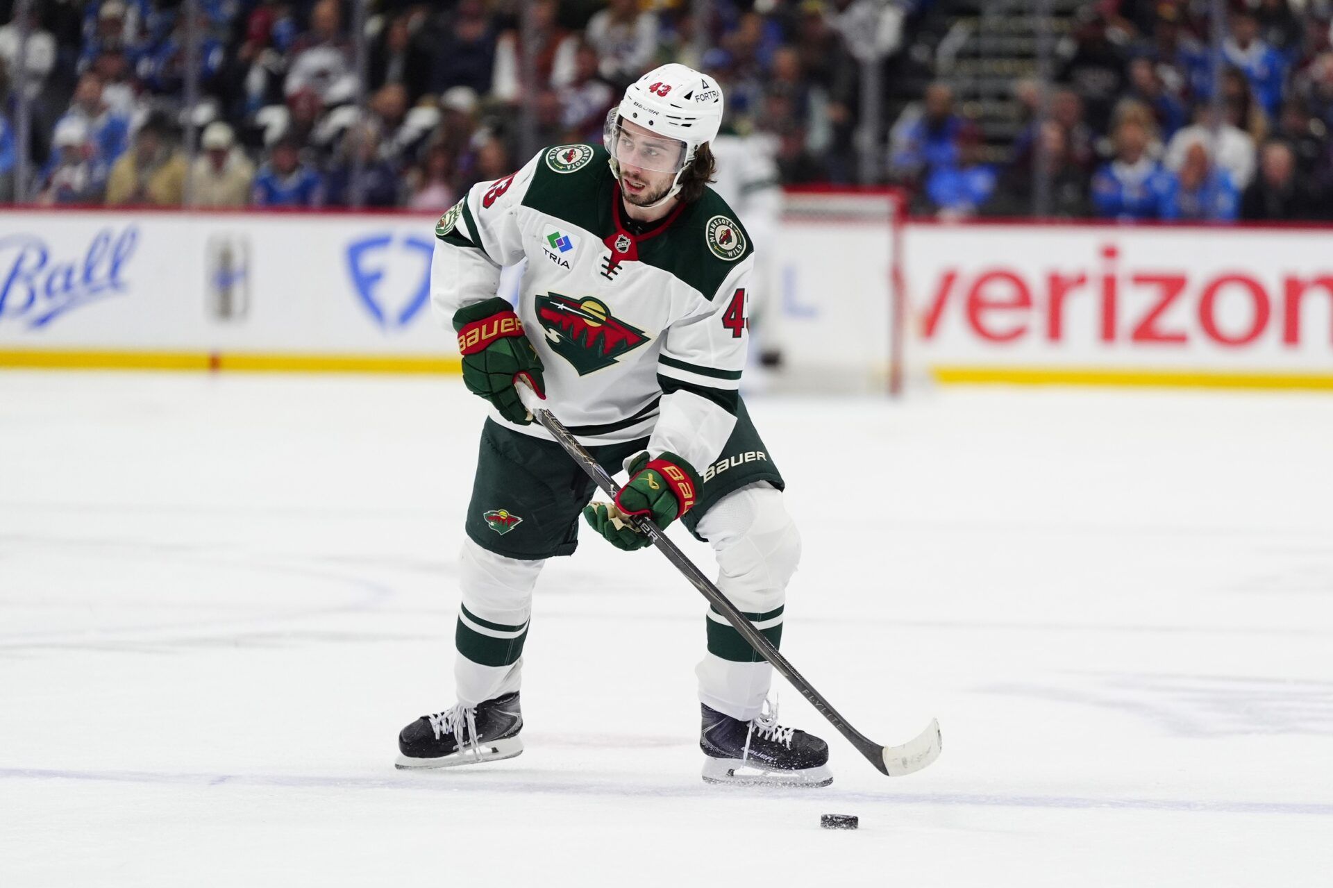 Minnesota Wild defenseman Quinn Hughes (43) prepares to shoot the puck against the Colorado Avalanche in game two of the second round of the 2026 Stanely Cup Playoffs at Ball Arena.