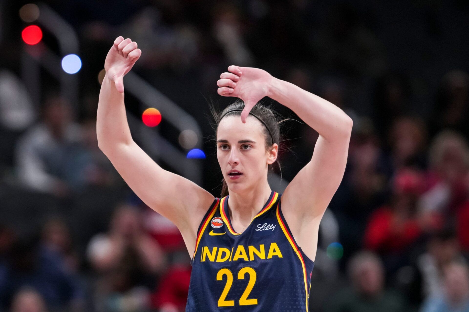Indiana Fever guard Caitlin Clark (22) gestures down the court Saturday, May 2, 2026, during the first half of a preseason game at Gainbridge Fieldhouse in Indianapolis.