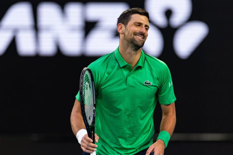 Novak Djokovic of Serbia in action against Carlos Alcaraz of Spain in the final of the mens singles at the Australian Open at Rod Laver Arena in Melbourne Park.