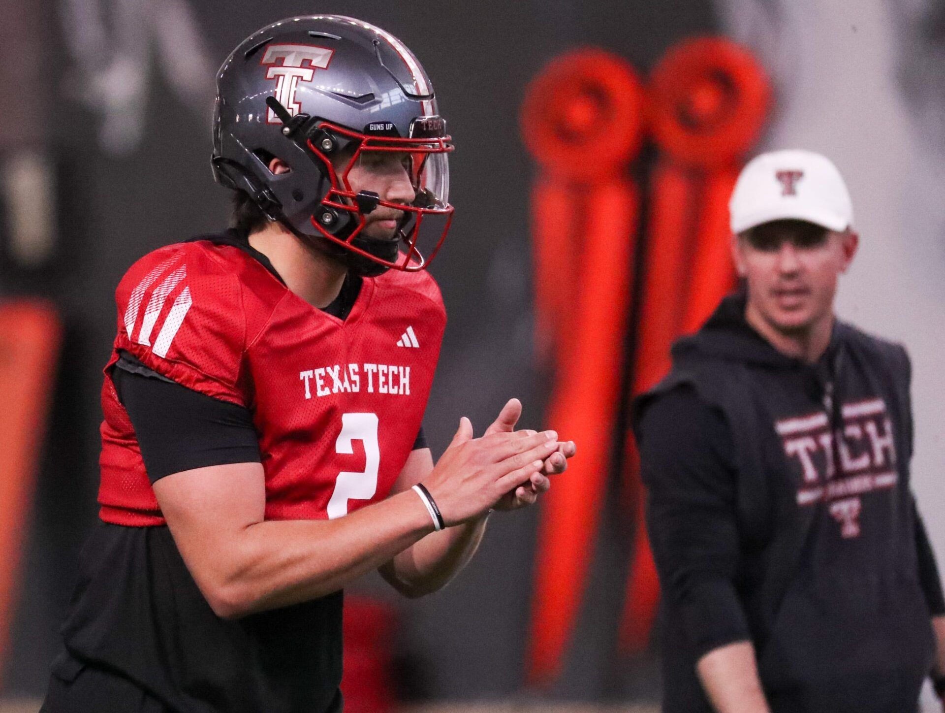 Texas Tech's Brendan Sorsby goes through a drill as offensive coordinator Mack Leftwich looks on during spring football practice, Tuesday, March 24, 2026, at the Womble Football Center.