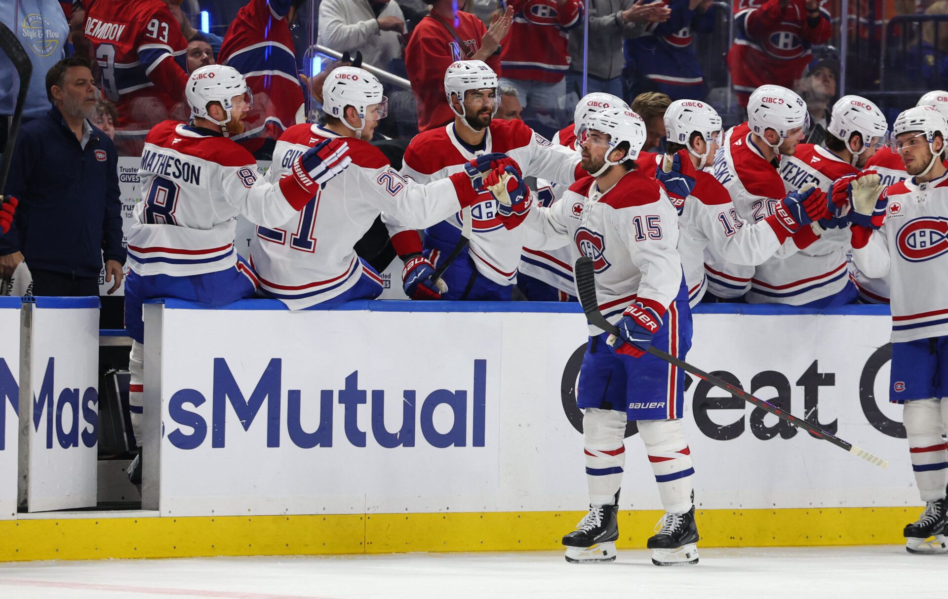 Montréal Canadiens center Alex Newhook (15) celebrates his goal with teammates during the second period against the Buffalo Sabres in game two of the second round of the 2026 Stanley Cup Playoffs at KeyBank Center.