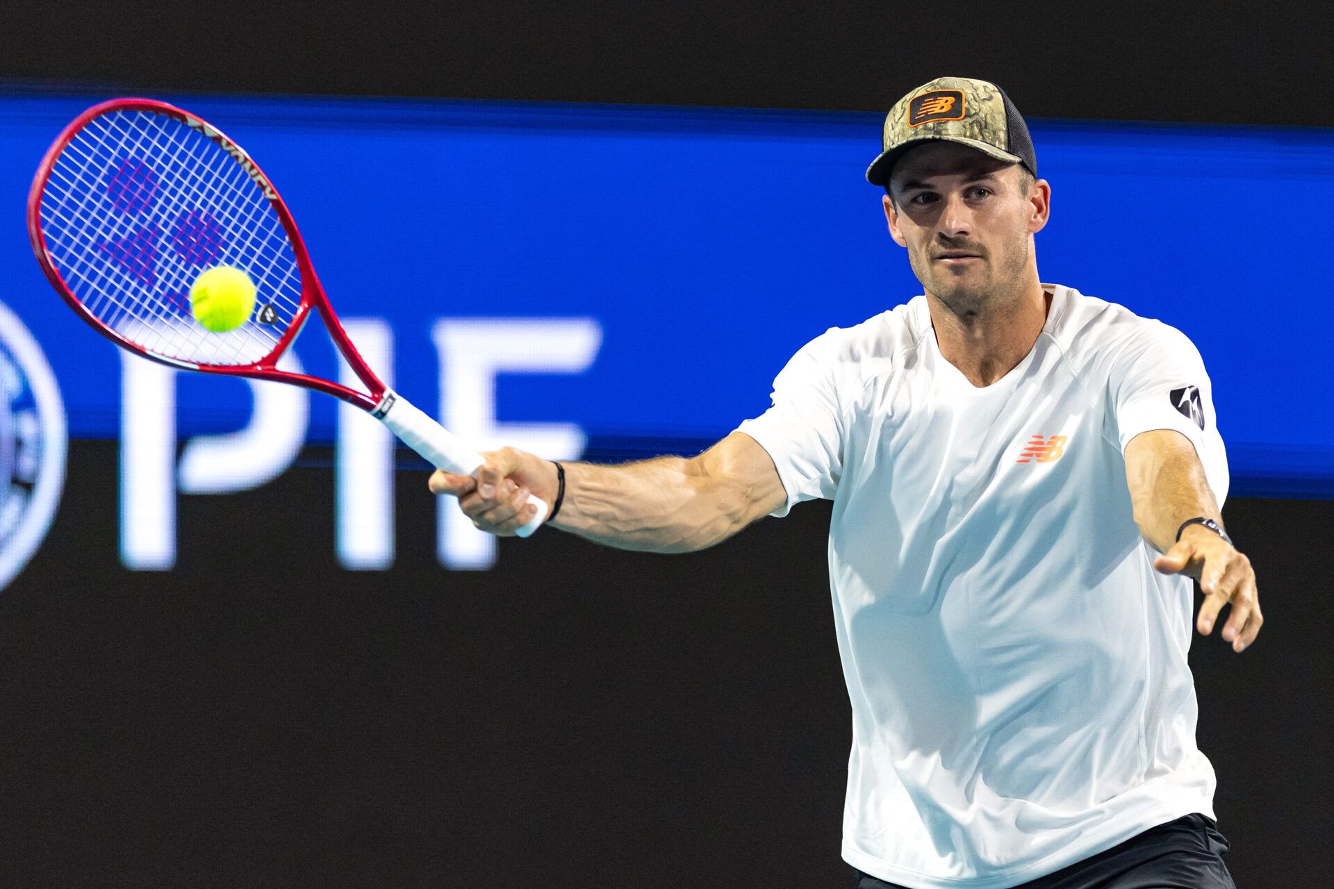Tommy Paul of the United States hits a forehand during his match against Arthur Fils of France in the quarter finals of the men’s singles at the Miami Open at Hard Rock Stadium.