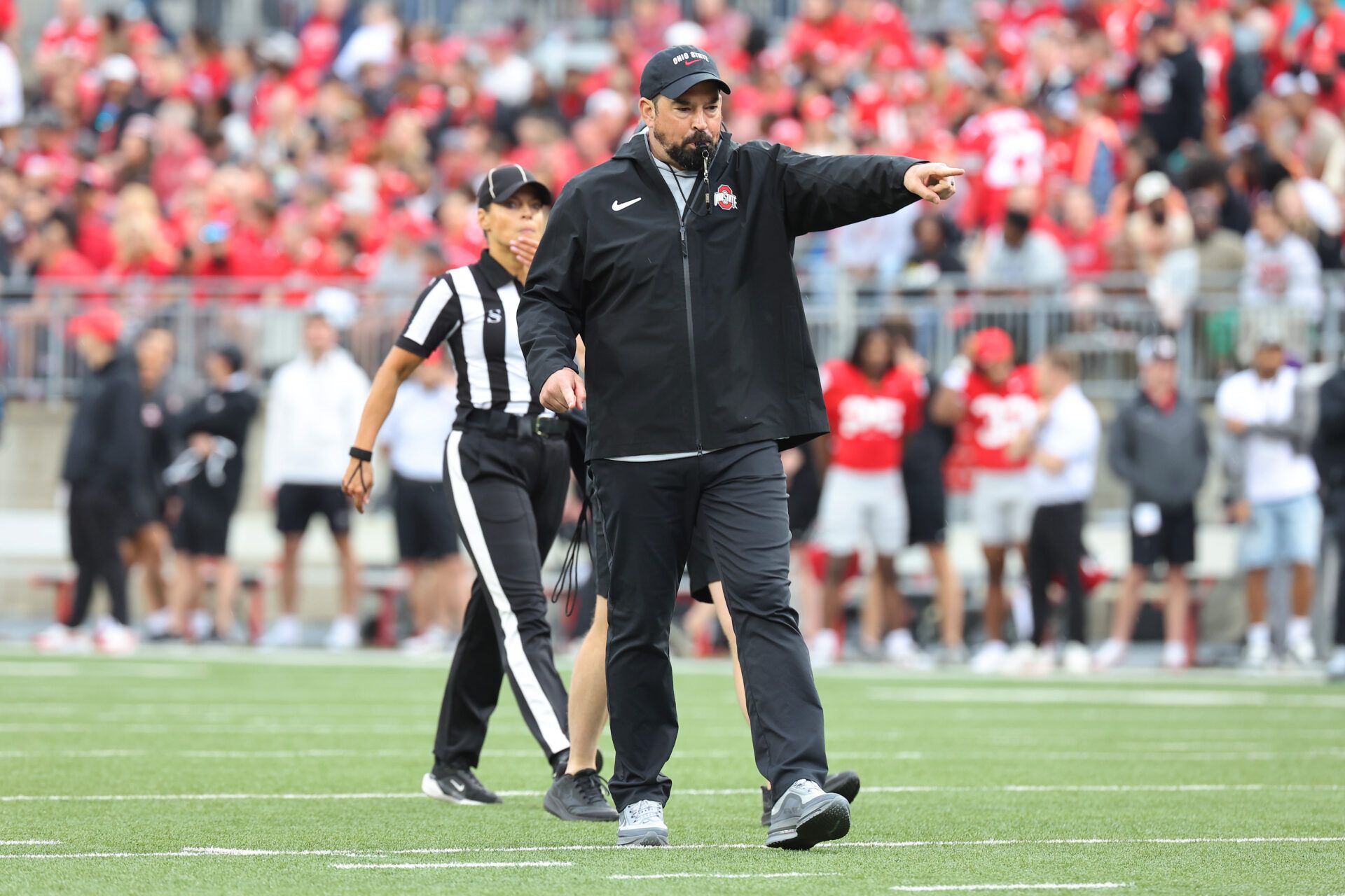 Ohio State head coach Ryan Day coaches during the annual spring game at Ohio Stadium.