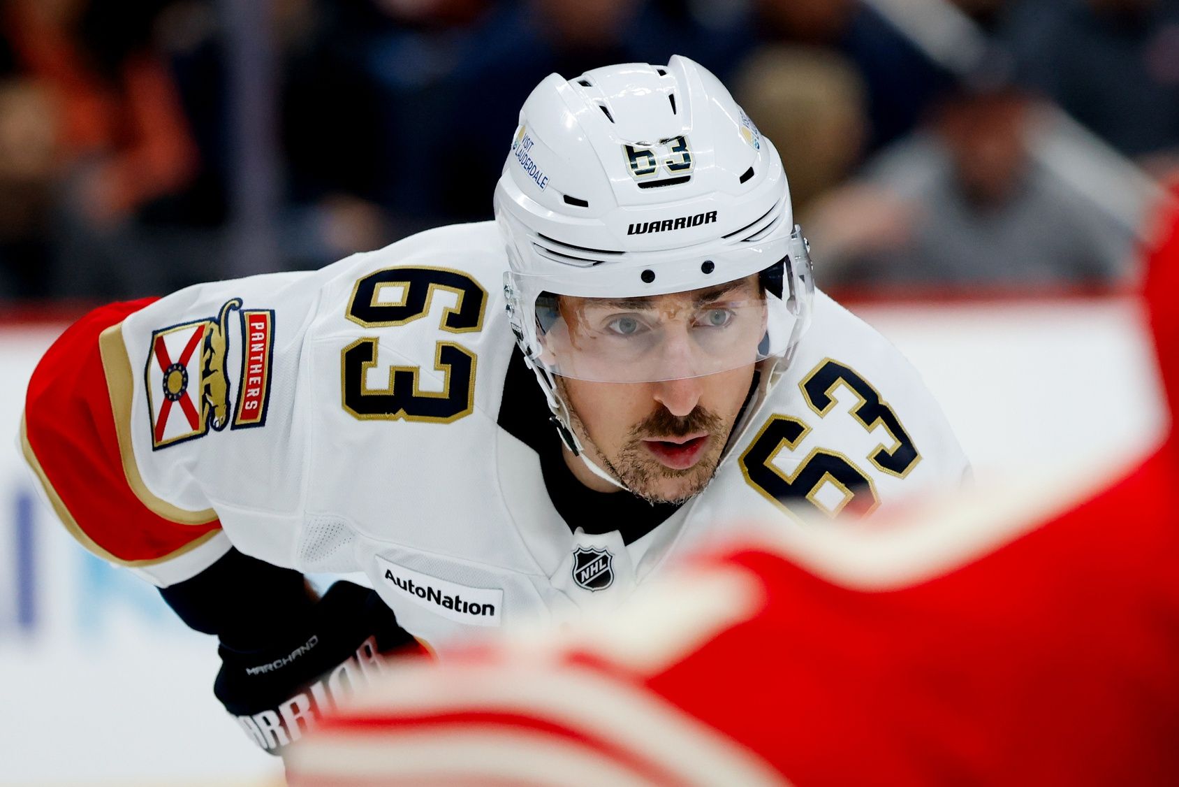 Florida Panthers left wing Brad Marchand (63) gets set during a face-off in the first period against the Detroit Red Wings at Little Caesars Arena.