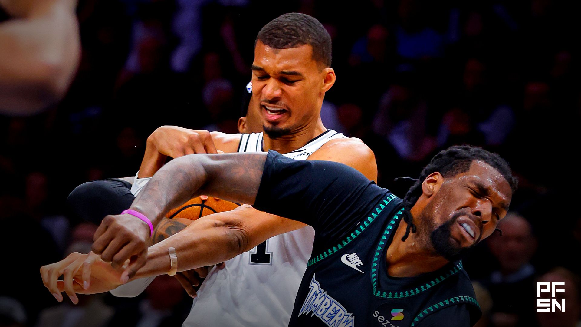 San Antonio Spurs center Victor Wembanyama (1) commits a level two flagrant foul against Minnesota Timberwolves center Naz Reid (11) in the second quarter of game four of the second round of the 2026 NBA Playoffs at Target Center. Wembanyama had to leave the game.