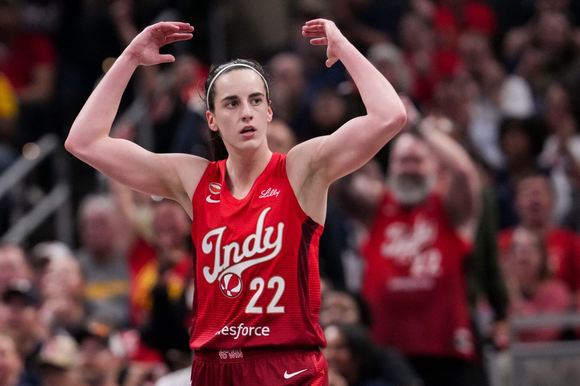 Indiana Fever guard Caitlin Clark (22) gets the crowd excited Saturday, May 9, 2026, during the second half of the Fevers season opener game at Gainbridge Fieldhouse in Indianapolis. The Dallas Wings defeated the Indiana Fever, 107-104.