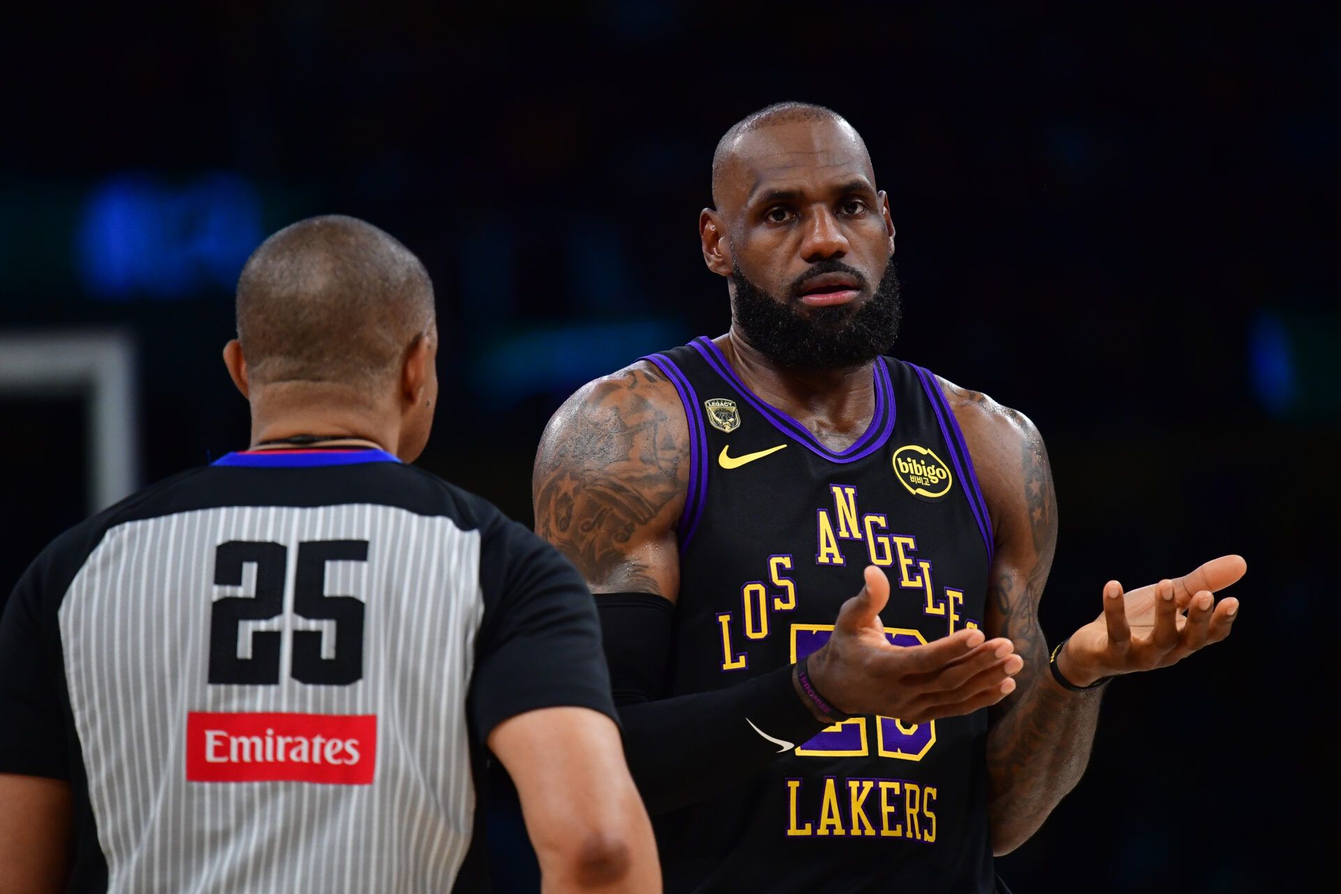 Los Angeles Lakers forward LeBron James (23) speaks with official Tony Brothers during the first half in game four of the second round of the 2026 NBA Playoffs at Crypto.com Arena.