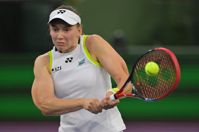 Elena Rybakina (KAZ) hits a shot as she defeated Elina Svitolina (BEL) in her semifinal match during the BNP Paribas Open at the Indian Wells Tennis Garden.