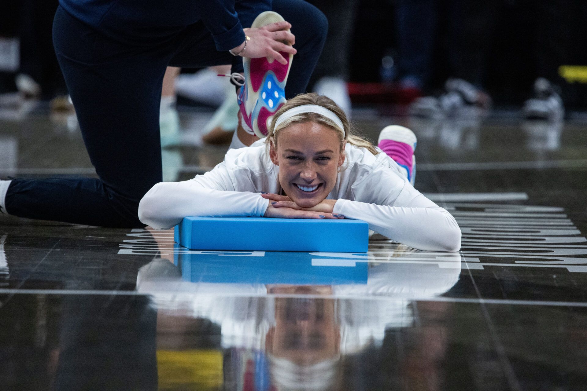 Indiana Fever guard Sophie Cunningham (8) stretches  before the game against the Dallas Wings at the Gainbridge Fieldhouse.