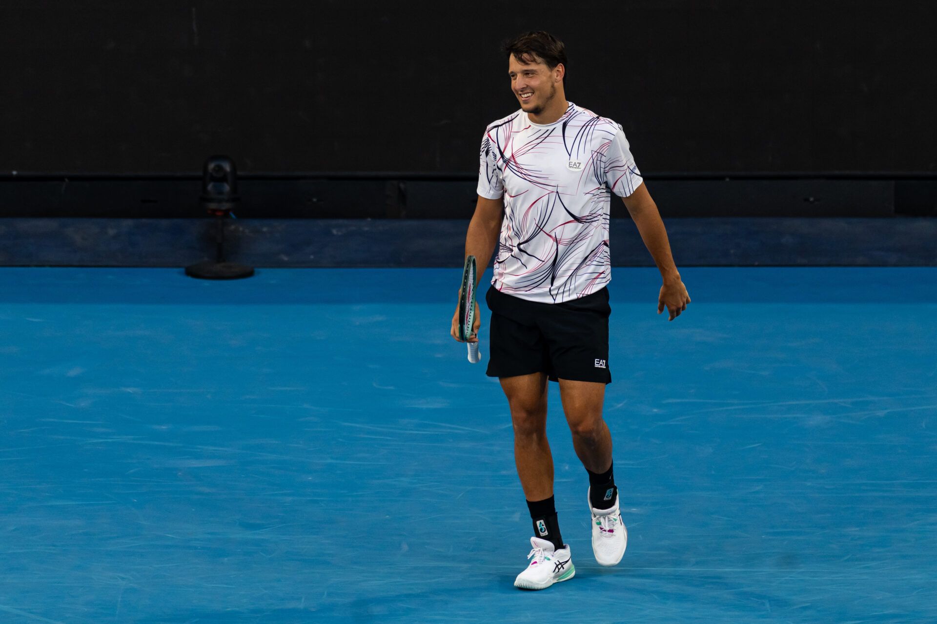 Luciano Darderi of Italy in action against Jannik Sinner of Italy in the fourth round of the mens singles at the Australian Open at Margaret Court Arena in Melbourne Park.