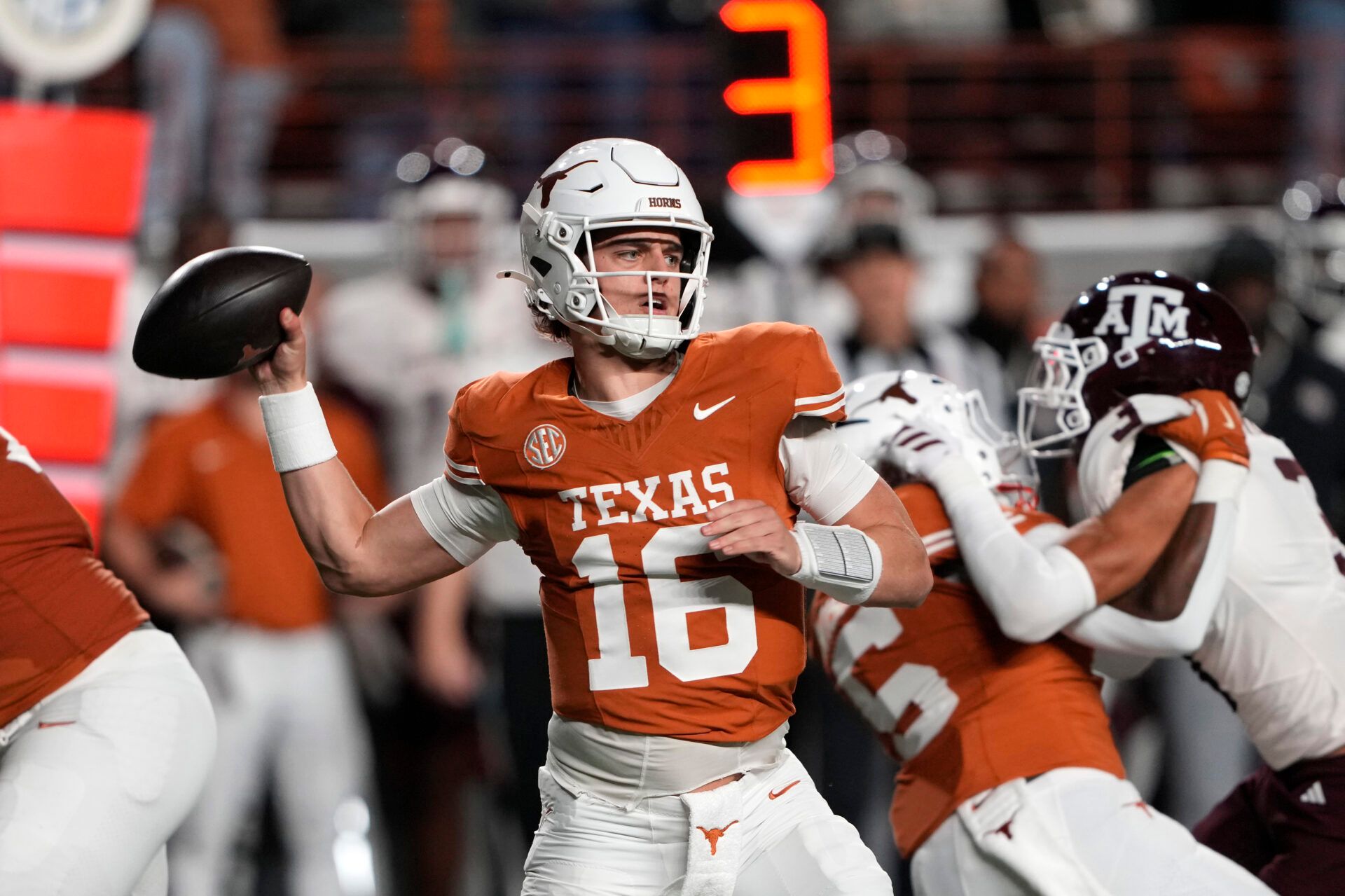 Texas Longhorns quarterback Arch Manning throws a pass during the first half against the Texas A&M Aggies at Darrell K Royal-Texas Memorial Stadium.