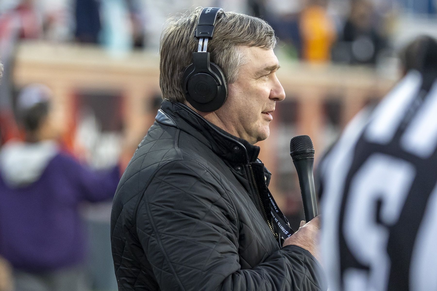 Georgia head football coach Kirby Smart visits the field during American Senior Bowl practice at Hancock Whitney Stadium.