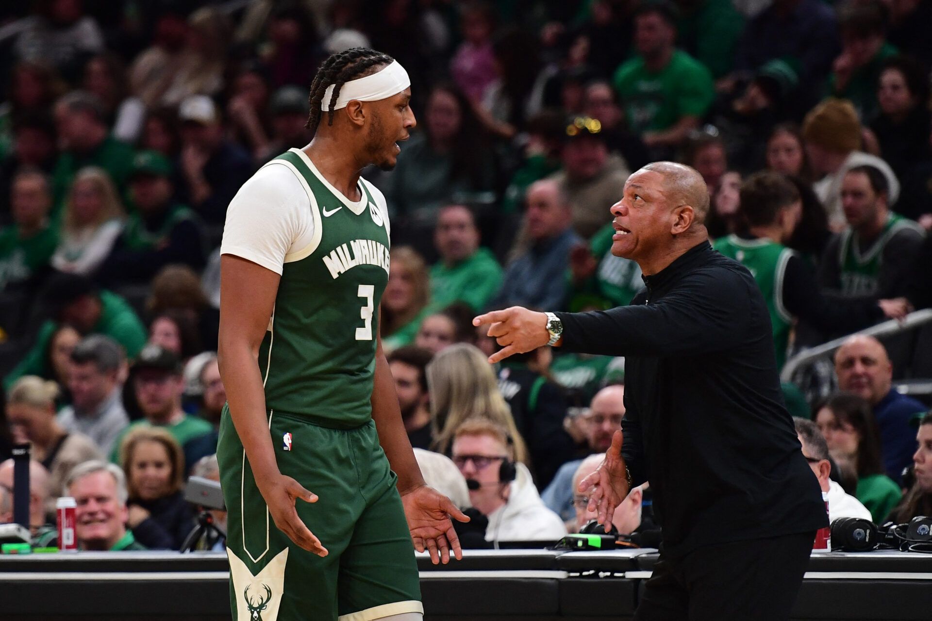 Milwaukee Bucks head coach Doc Rivers has words with center Myles Turner (3) during the second half against the Boston Celtics at TD Garden.
