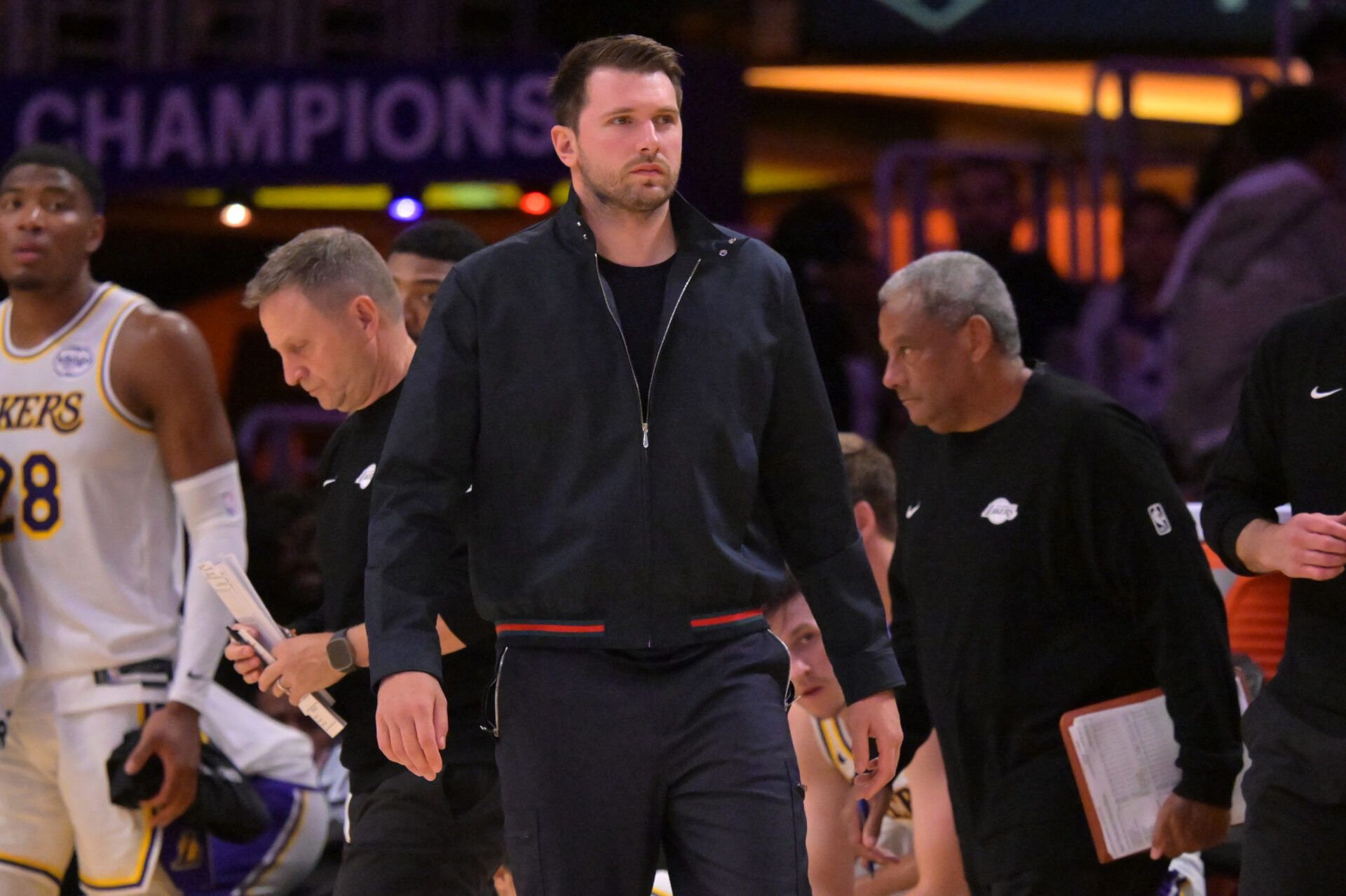 Los Angeles Lakers guard Luka Doncic (77) looks on from the bench in the final minutes of game three of the second round of the 2026 NBA Playoffs against the Oklahoma City Thunder at Crypto.com Arena.