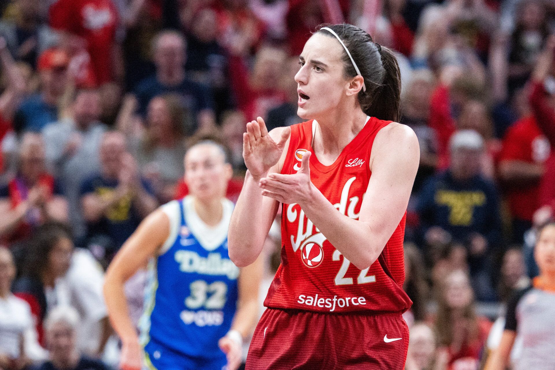 Indiana Fever guard Caitlin Clark (22) celebrates in the second half against the Dallas Wings at Gainbridge Fieldhouse.