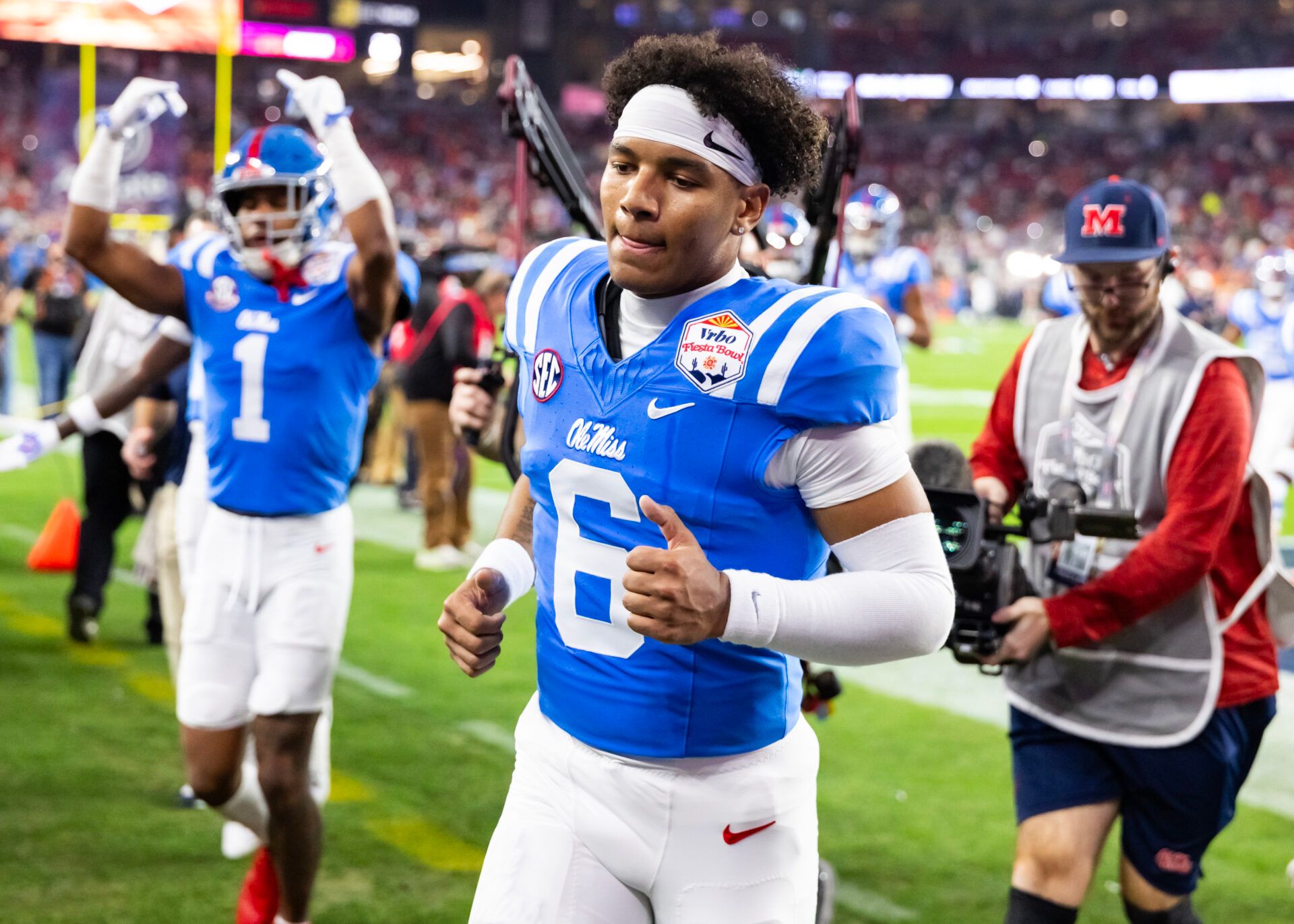 Mississippi Rebels quarterback Trinidad Chambliss (6) against the Miami Hurricanes during the 2026 Fiesta Bowl and semifinal game of the College Football Playoff at State Farm Stadium.
