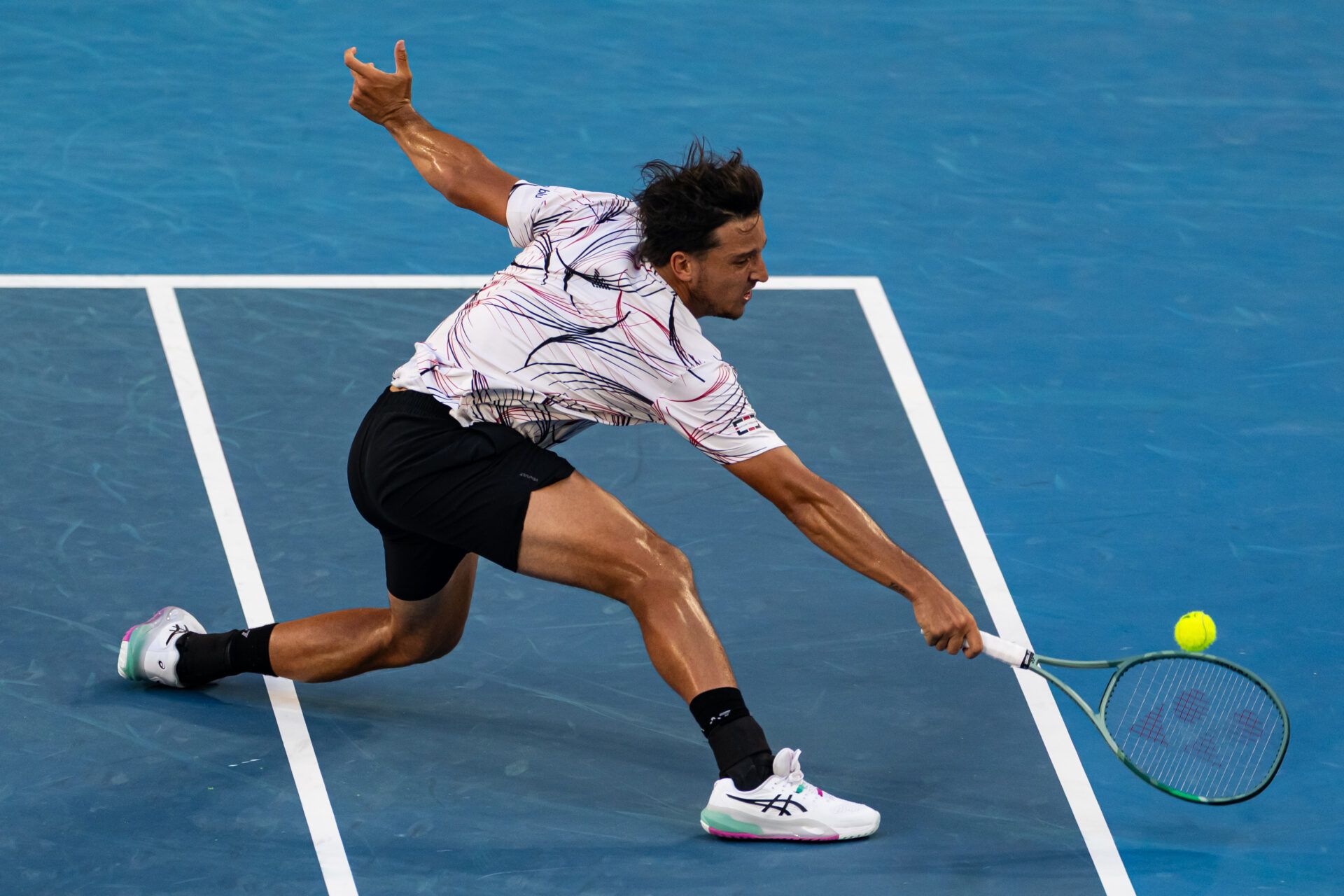 Luciano Darderi of Italy in action against Jannik Sinner of Italy in the fourth round of the mens singles at the Australian Open at Margaret Court Arena in Melbourne Park.