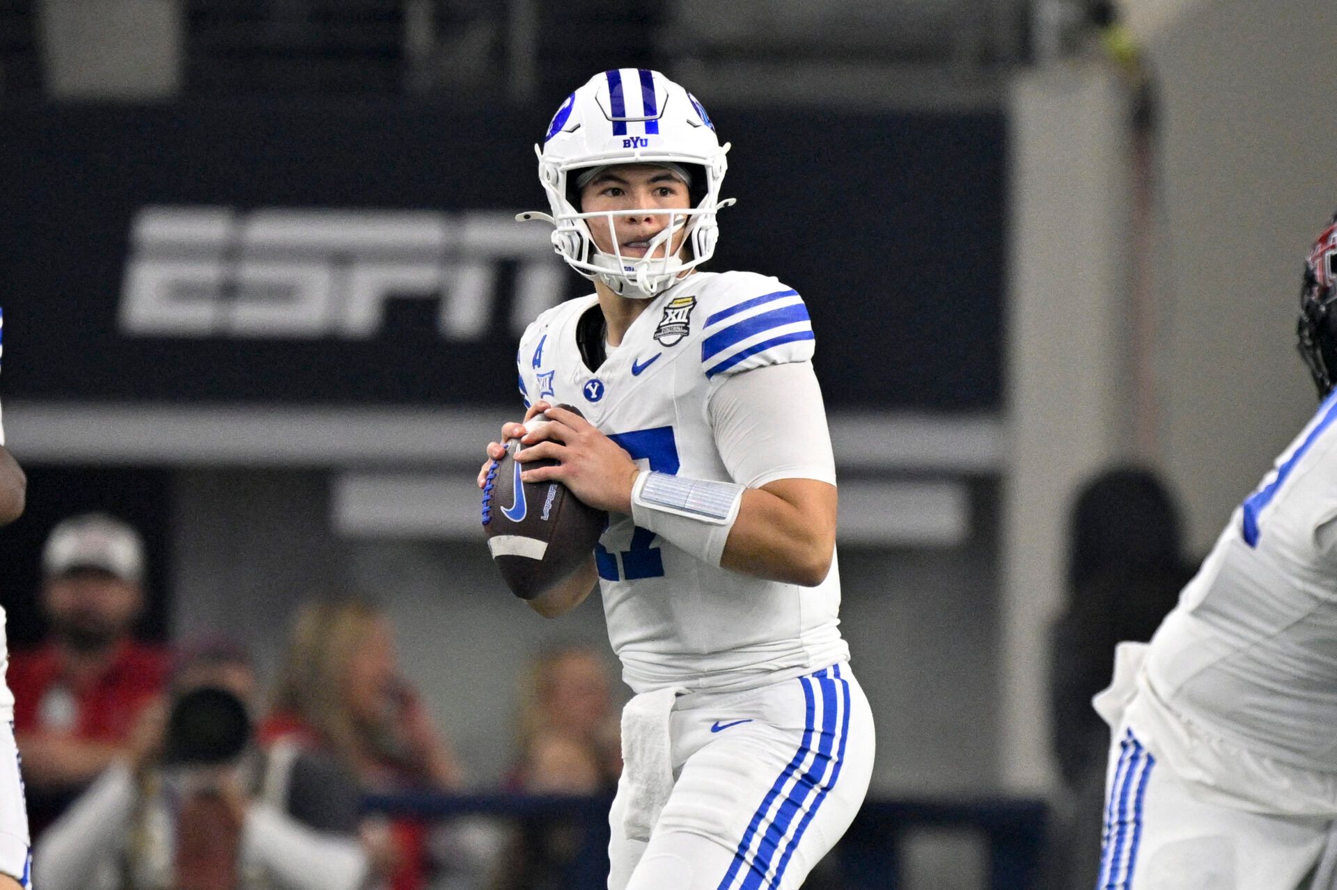 BYU Cougars quarterback Bear Bachmeier (47) looks to pass against the Texas Tech Red Raiders during the first half at AT&T Stadium.