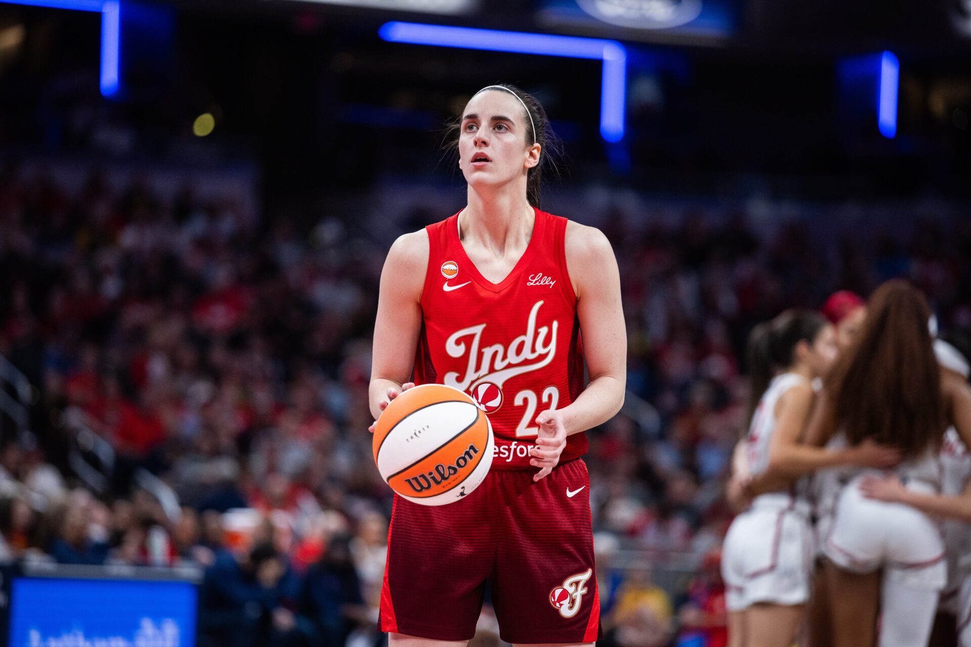 Indiana Fever guard Caitlin Clark (22) shoots the ball  in the second half against the Washington Mystics at Gainbridge Fieldhouse.