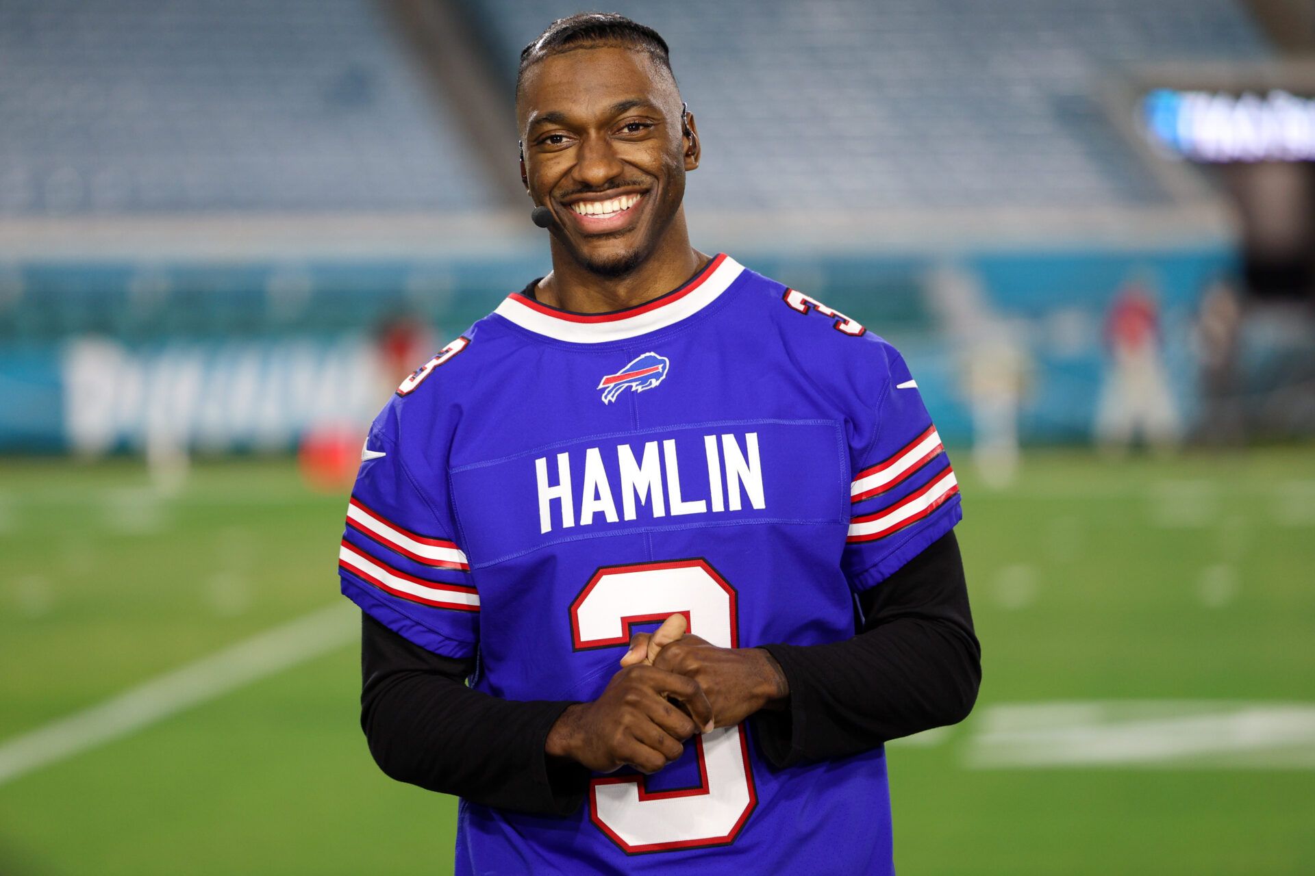 Monday Night Countdown analyst Robert Griffin III wears a Buffalo Bills safety Damar Hamlin (3) jersey for a broadcast before a game featuring the Tennessee Titans and Jacksonville Jaguars at TIAA Bank Field.