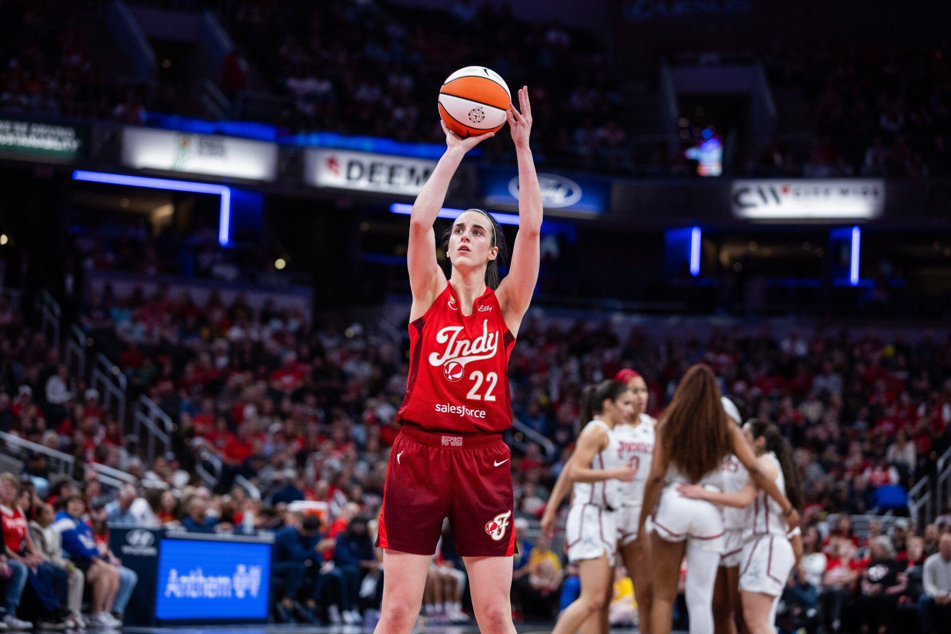 Indiana Fever guard Caitlin Clark (22) shoots the ball  in the second half against the Washington Mystics at Gainbridge Fieldhouse.