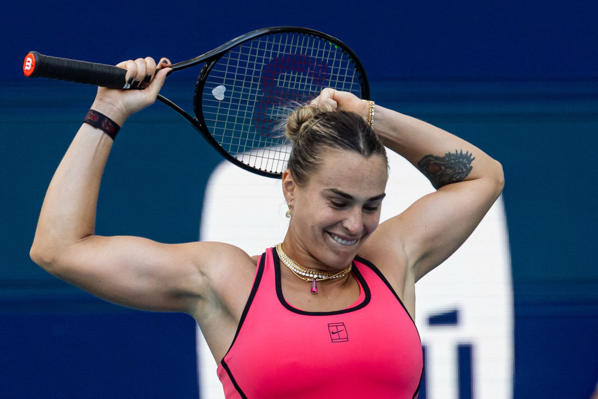 Aryna Sabalenka of Belarus celebrates beating Coco Gauff of the United States in the final of the women’s singles at the Hard Rock Stadium.