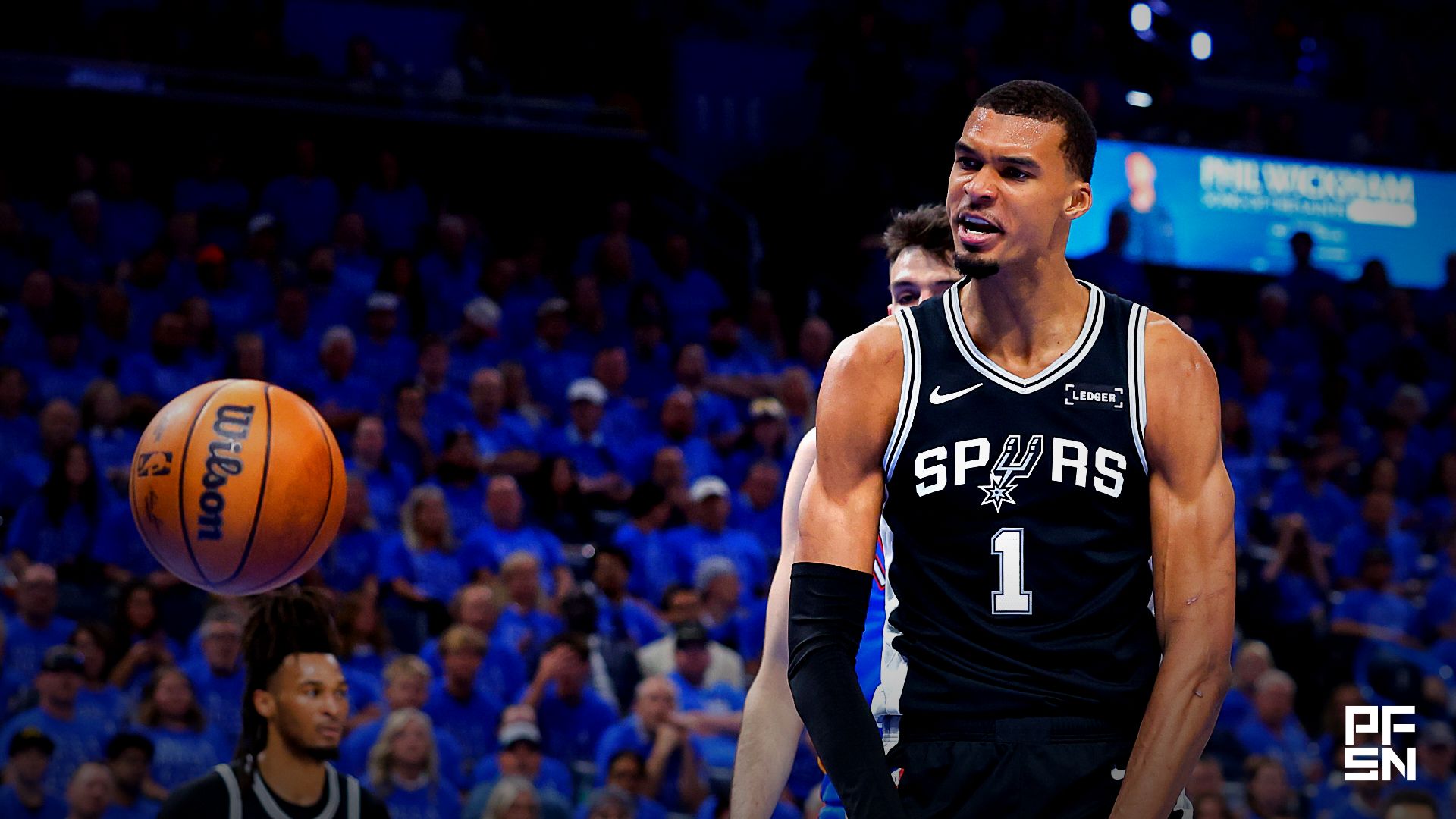 San Antonio Spurs center Victor Wembanyama (1) reacts after a dunk in the second quarter against the Oklahoma City Thunder during game one of the western conference finals for the 2026 NBA playoffs at Paycom Center.