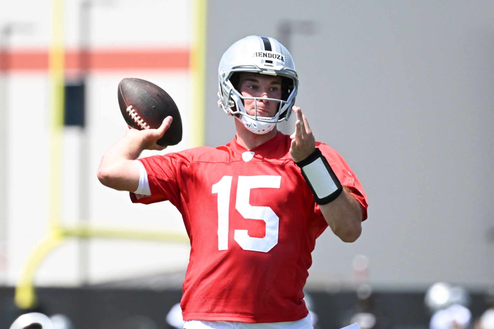 Las Vegas Raiders quarterback Fernando Mendoza (15) runs through a drill during a Rookie Minicamp at Intermountain Health Performance Center.