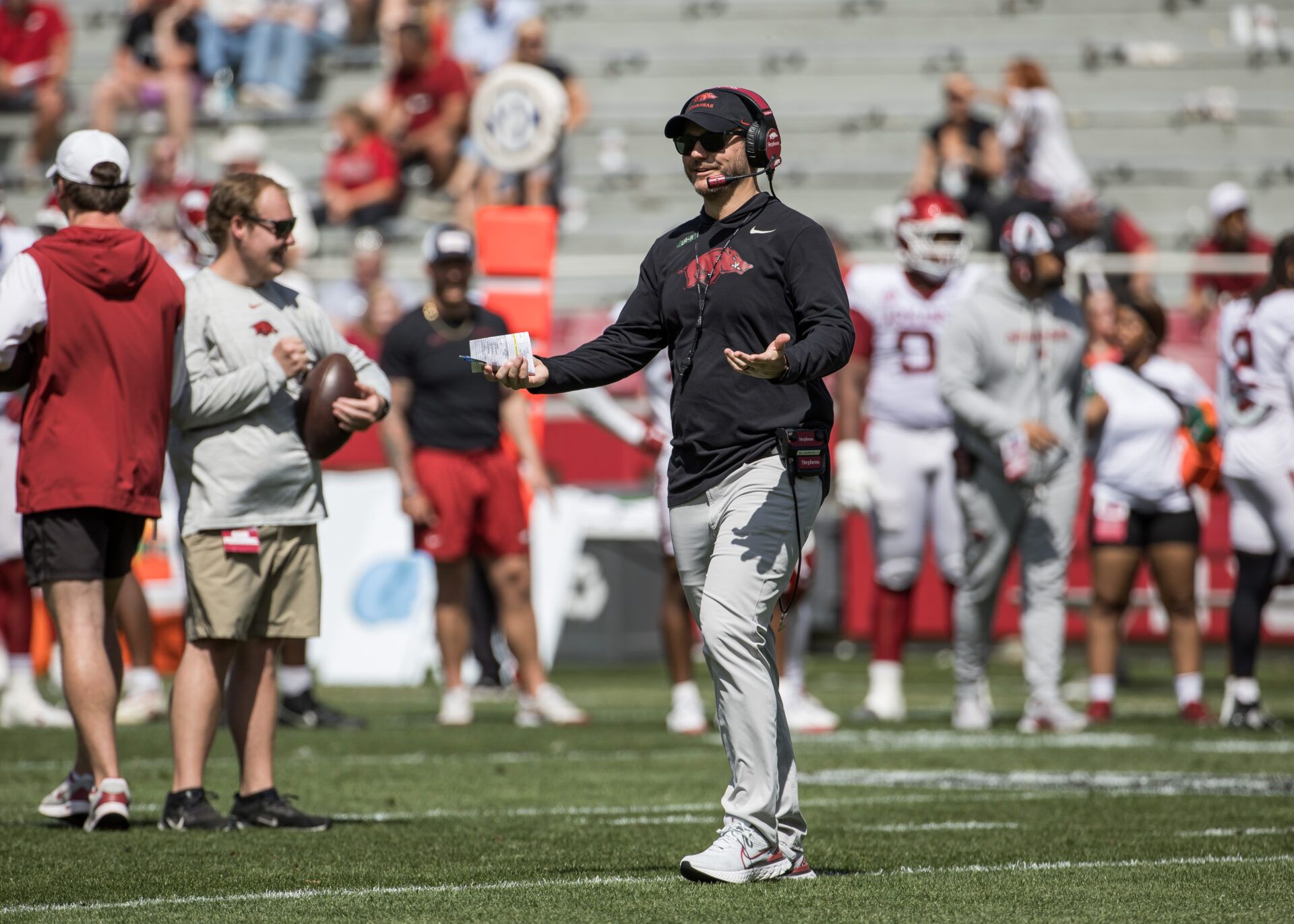 Arkansas Razorbacks head coach Ryan Silverfield looks over to the sidelines  during the spring game at Donald W. Reynolds Razorback Stadium.