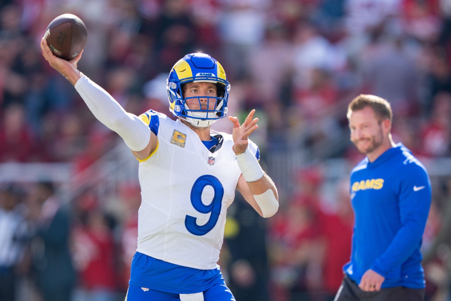 Los Angeles Rams quarterback Matthew Stafford (9) warms up in front of head coach Sean McVay (right) before the game against the San Francisco 49ers at Levi's Stadium.