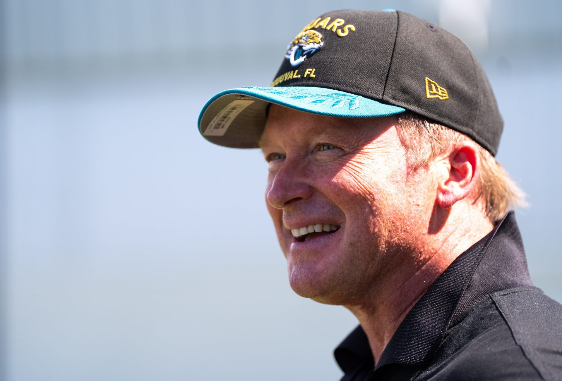 Former NFL Coache Jon Gruden have a laugh while attending an NFL training camp session ten at the Miller Electric Center, Tuesday, Aug. 5, 2025, in Jacksonville, Fla. [Doug Engle/Florida Times-Union]