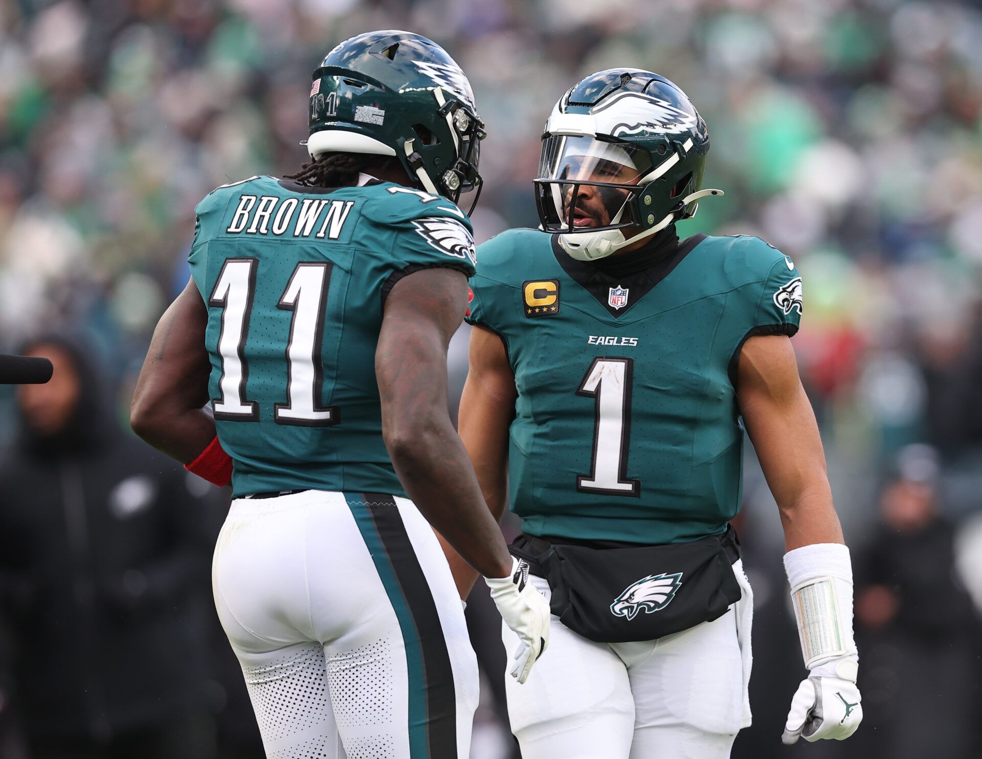 Philadelphia Eagles quarterback Jalen Hurts (1) reacts with wide receiver A.J. Brown (11) after their touchdown connection during the fourth quarter against the Las Vegas Raiders at Lincoln Financial Field.