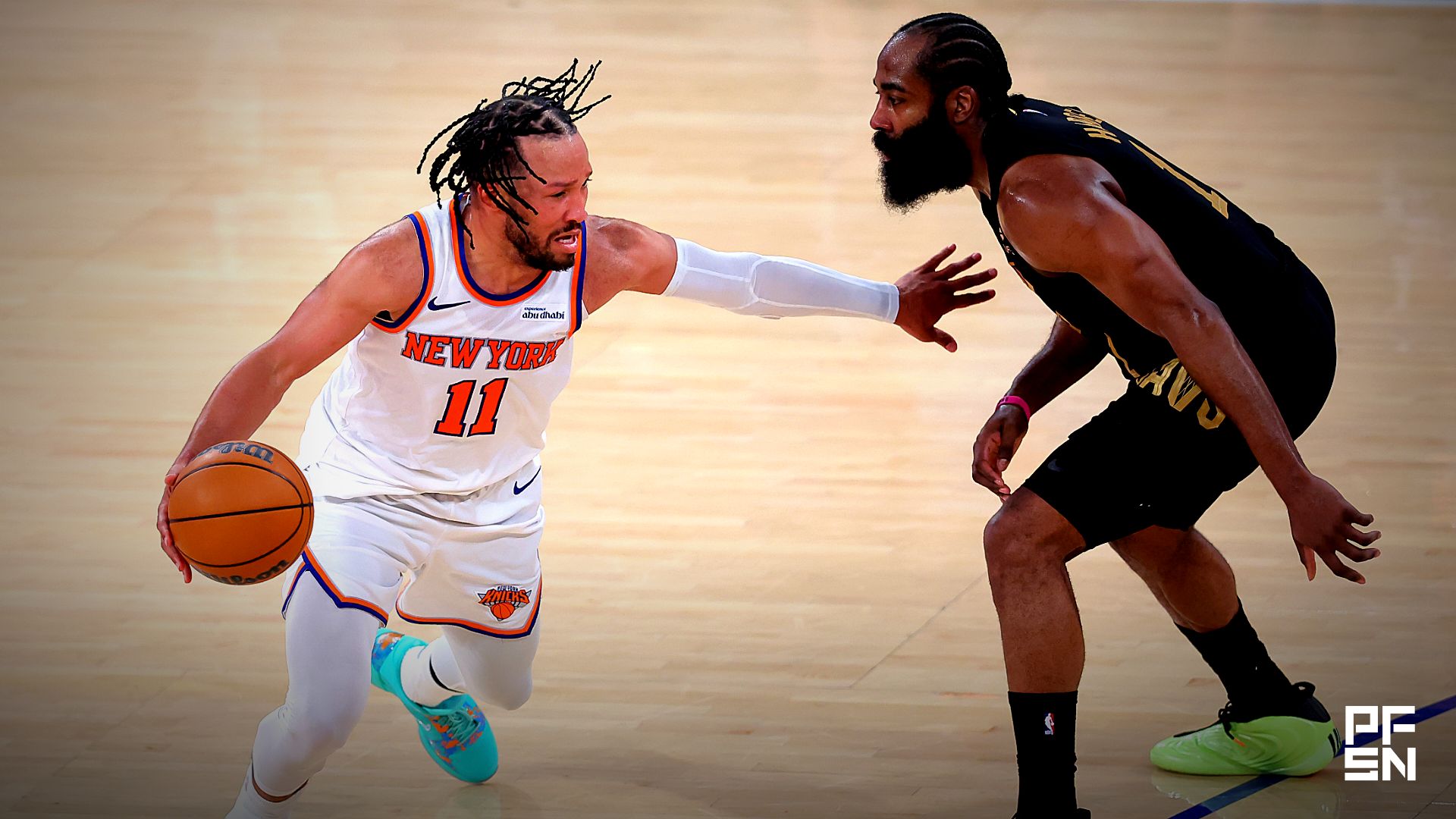 New York Knicks guard Jalen Brunson (11) controls the ball against Cleveland Cavaliers guard James Harden (1) during the fourth quarter of game one of the eastern conference finals during the 2026 NBA playoffs at Madison Square Garden.