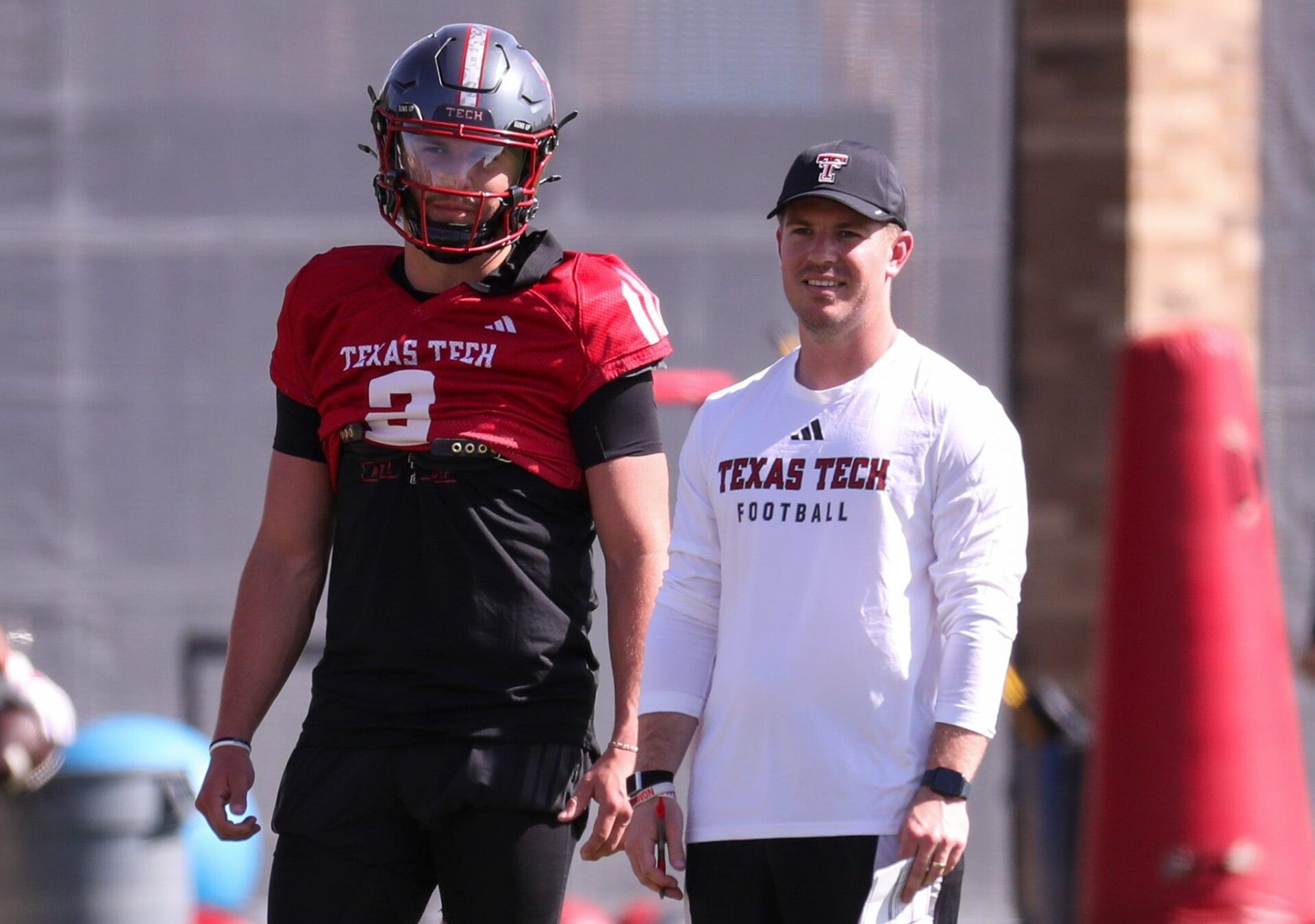 Texas Tech's Brendan Sorsby and offensive coordinator Mack Leftwich look on during spring football practice, Thursday, March 26, 2026, at the Womble Football Center.