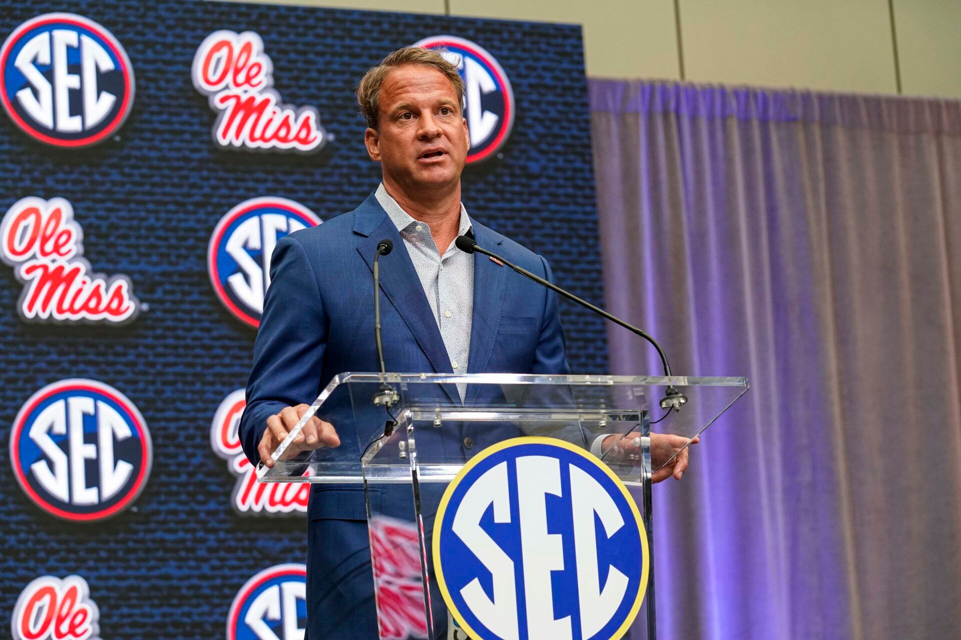 Mississippi head coach Lane Kiffin speaks to the media during SEC Media Days at the College Football Hall of Fame.
